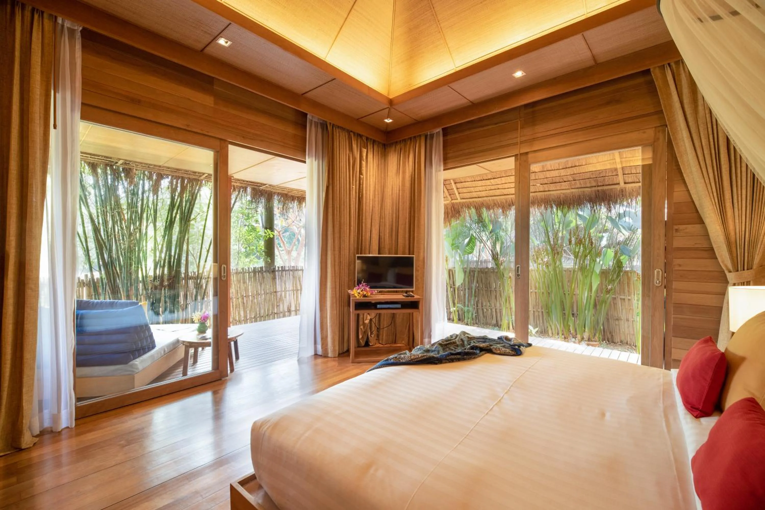 Bed in Pai Village Boutique Resort