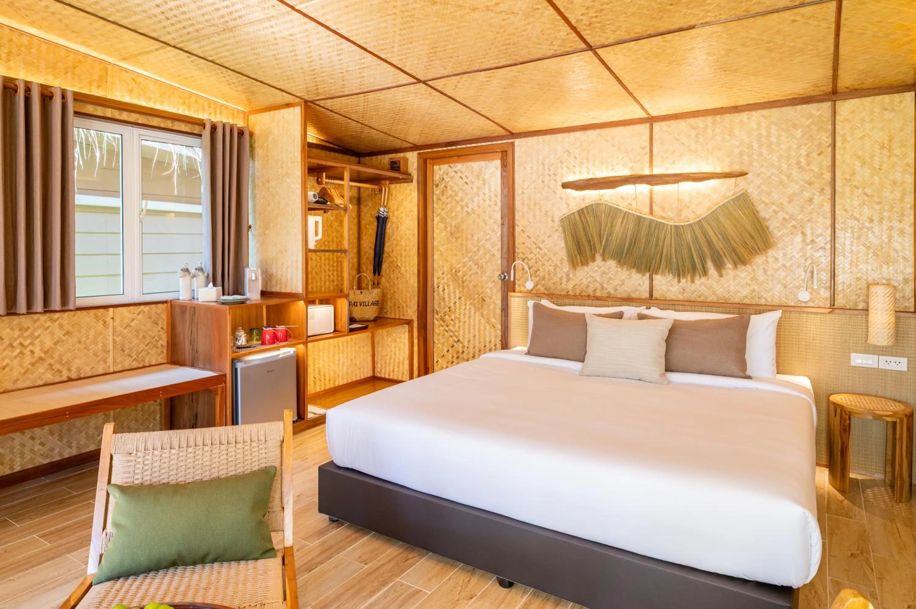 Bed in Pai Village Boutique Resort