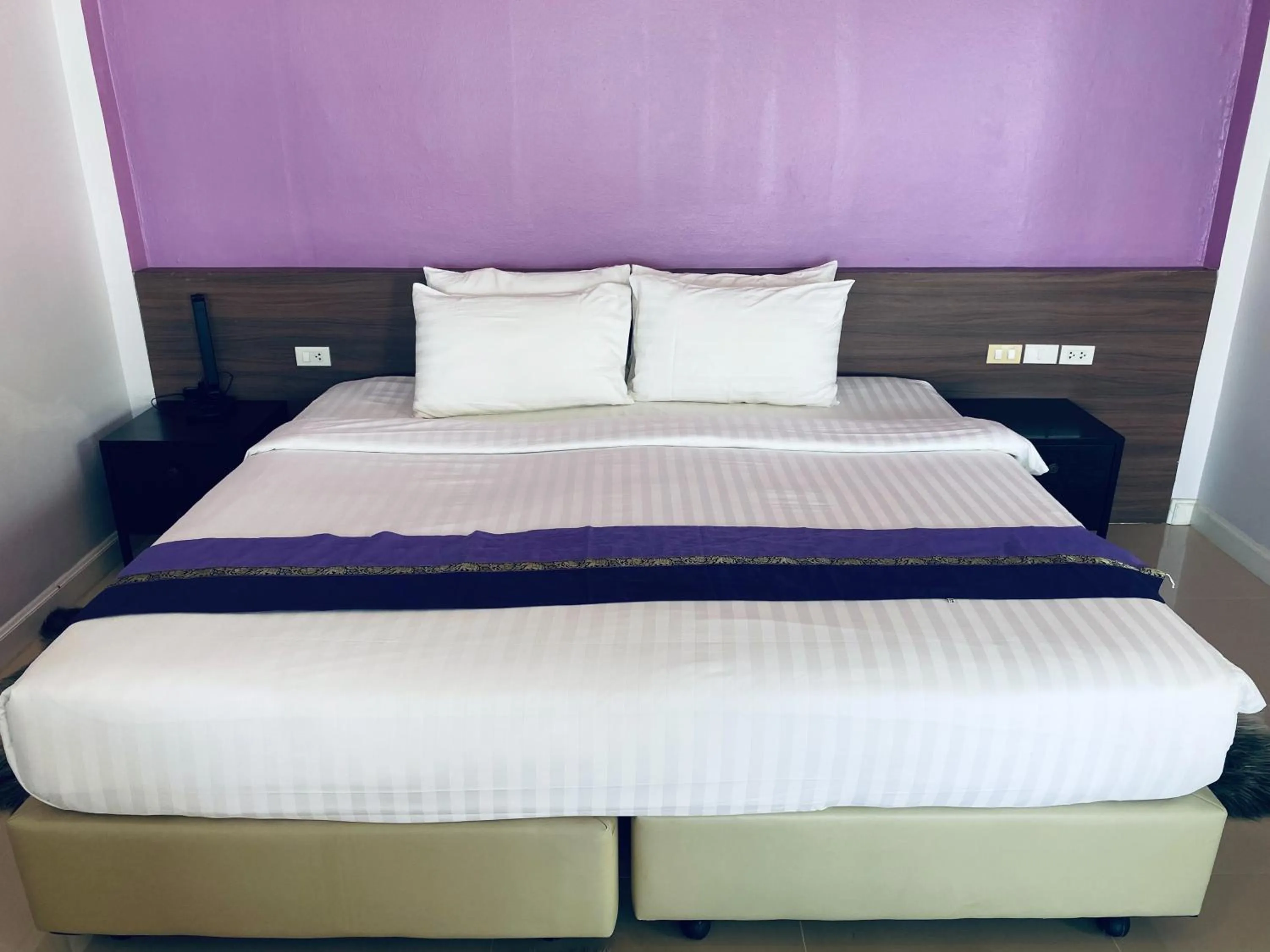 Bed in Bella Vista Beach Resort Koh Lipe