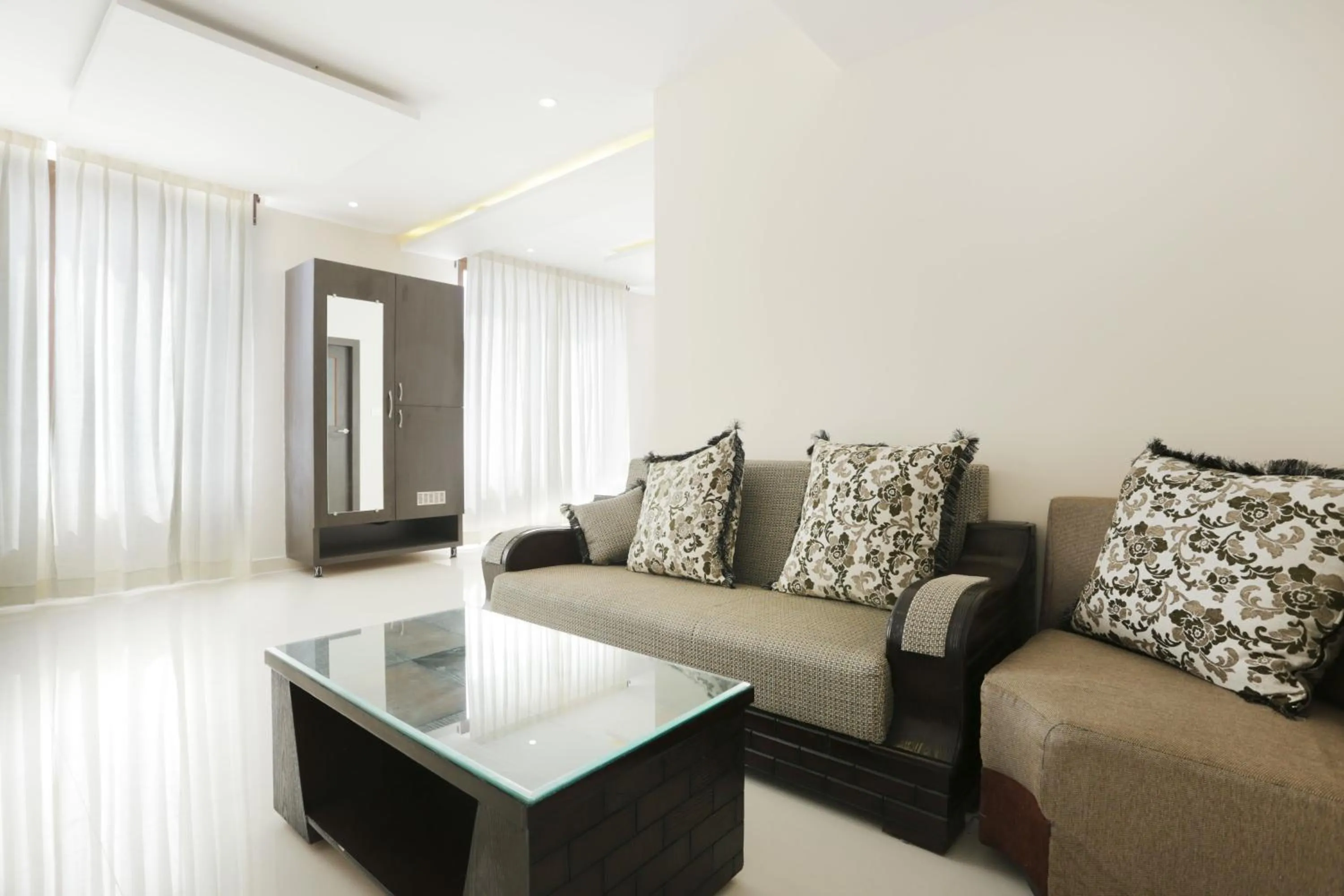 Seating area in Treebo Sunrise IG Road