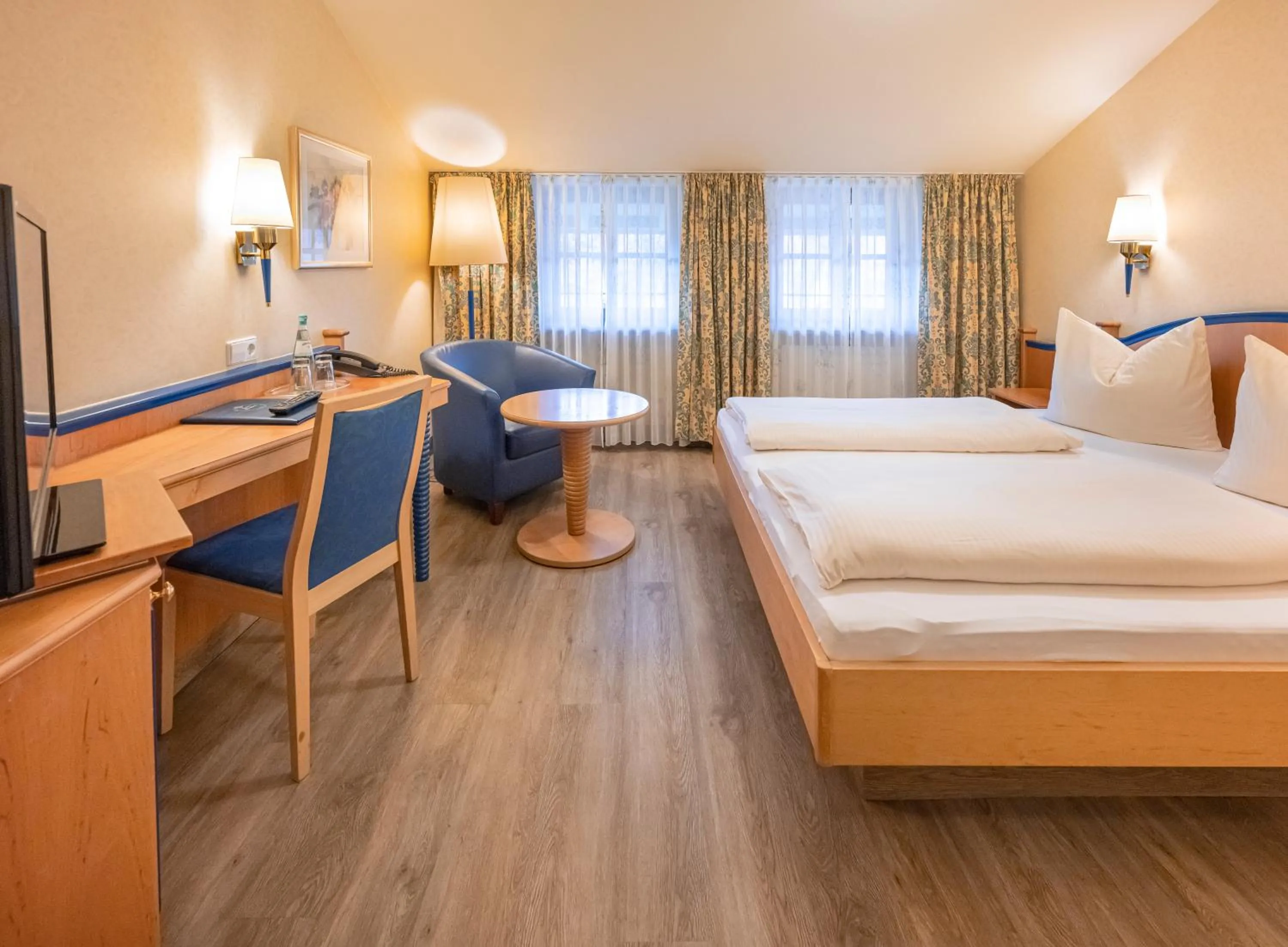 Bed in Hotel Neuwirt