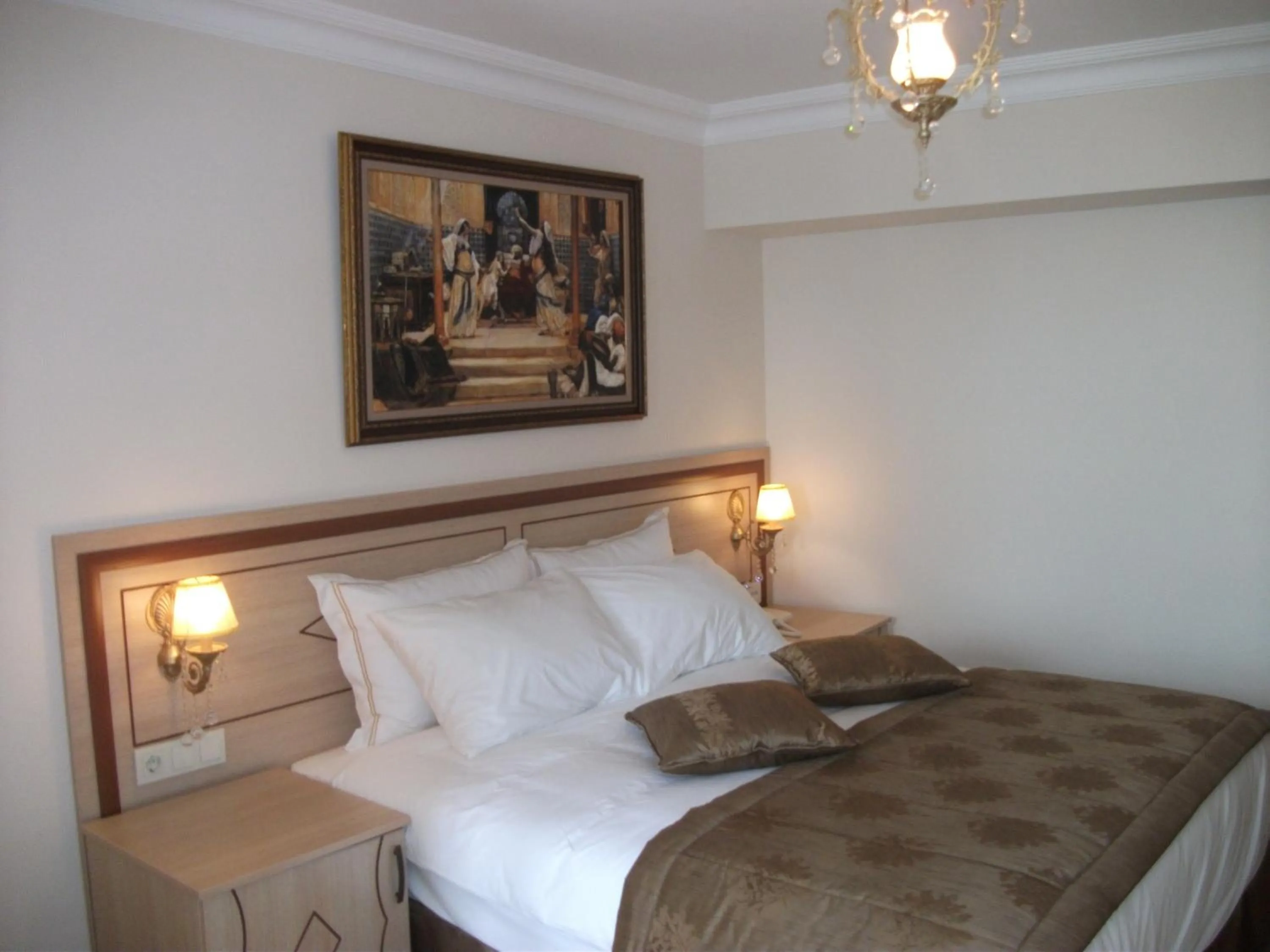 Bed in Sultan Palace Hotel