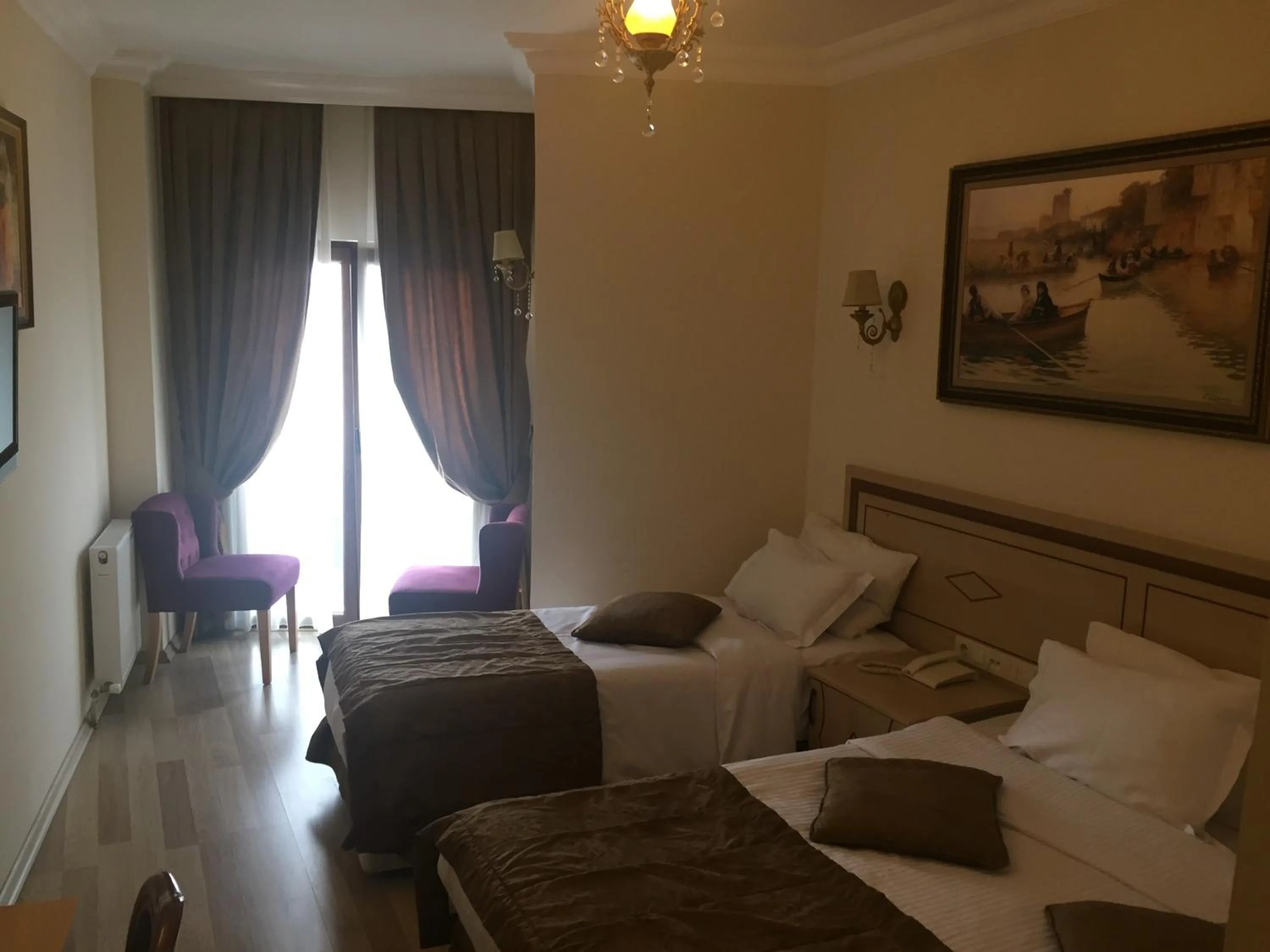 Bed in Sultan Palace Hotel