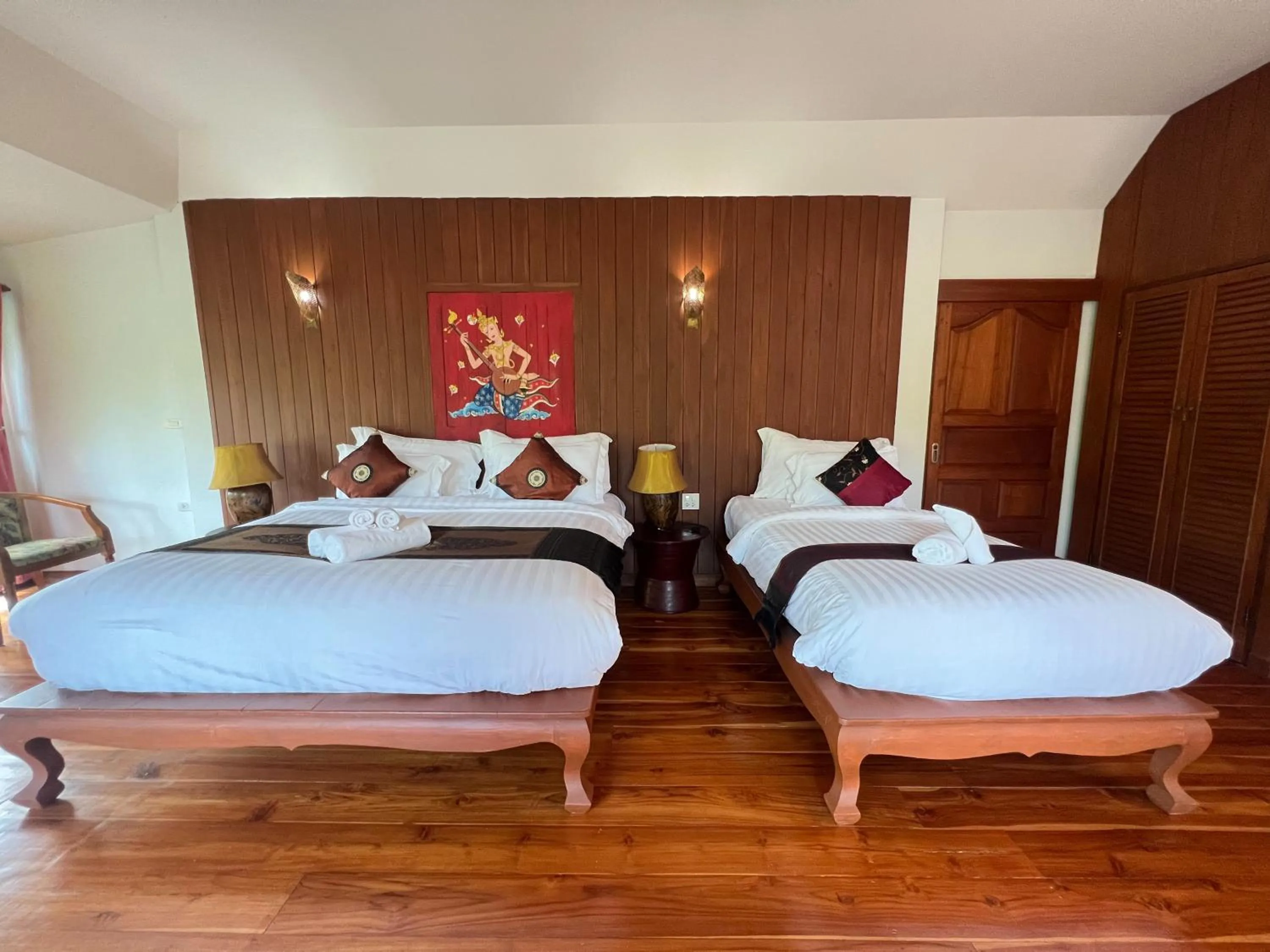 Bed in Sasidara Resort Nan