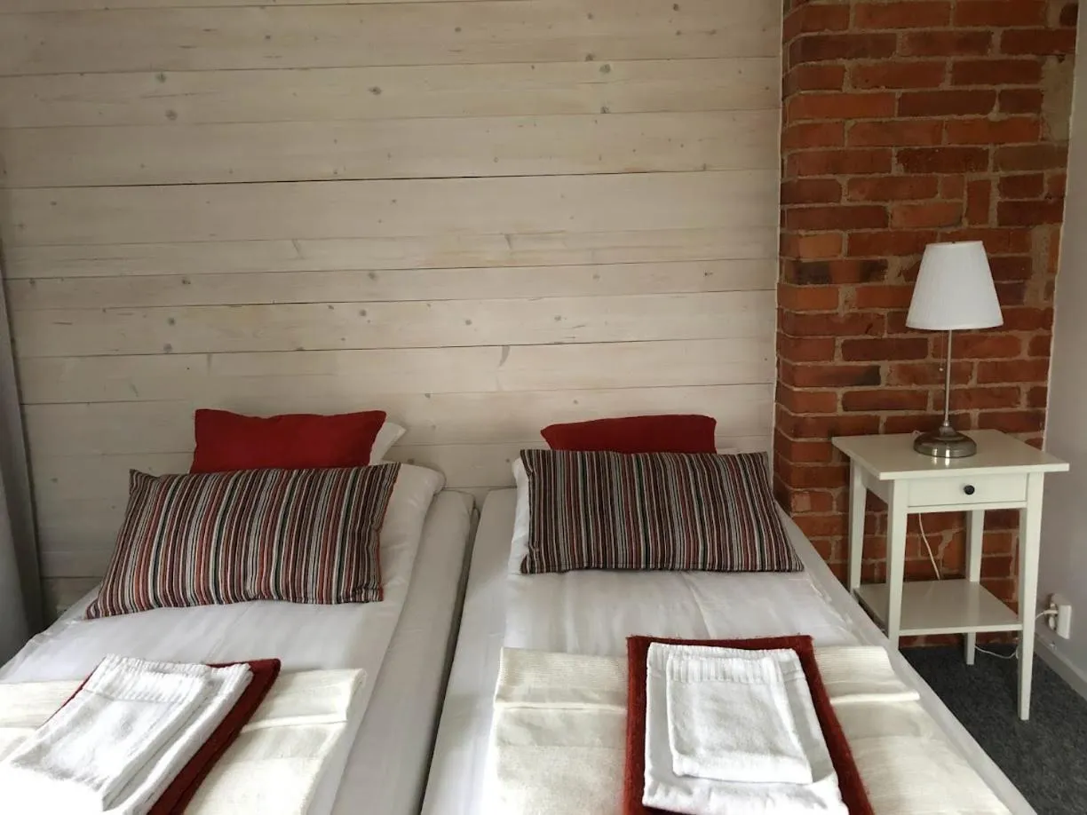 Photo of the whole room, Bed in Ödevata Gårdshotell