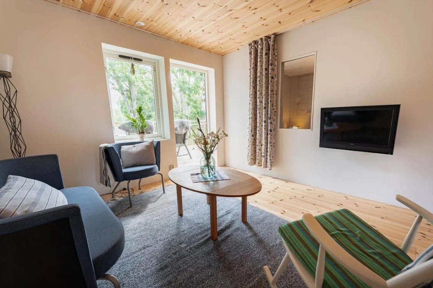 Living room in Ödevata Gårdshotell