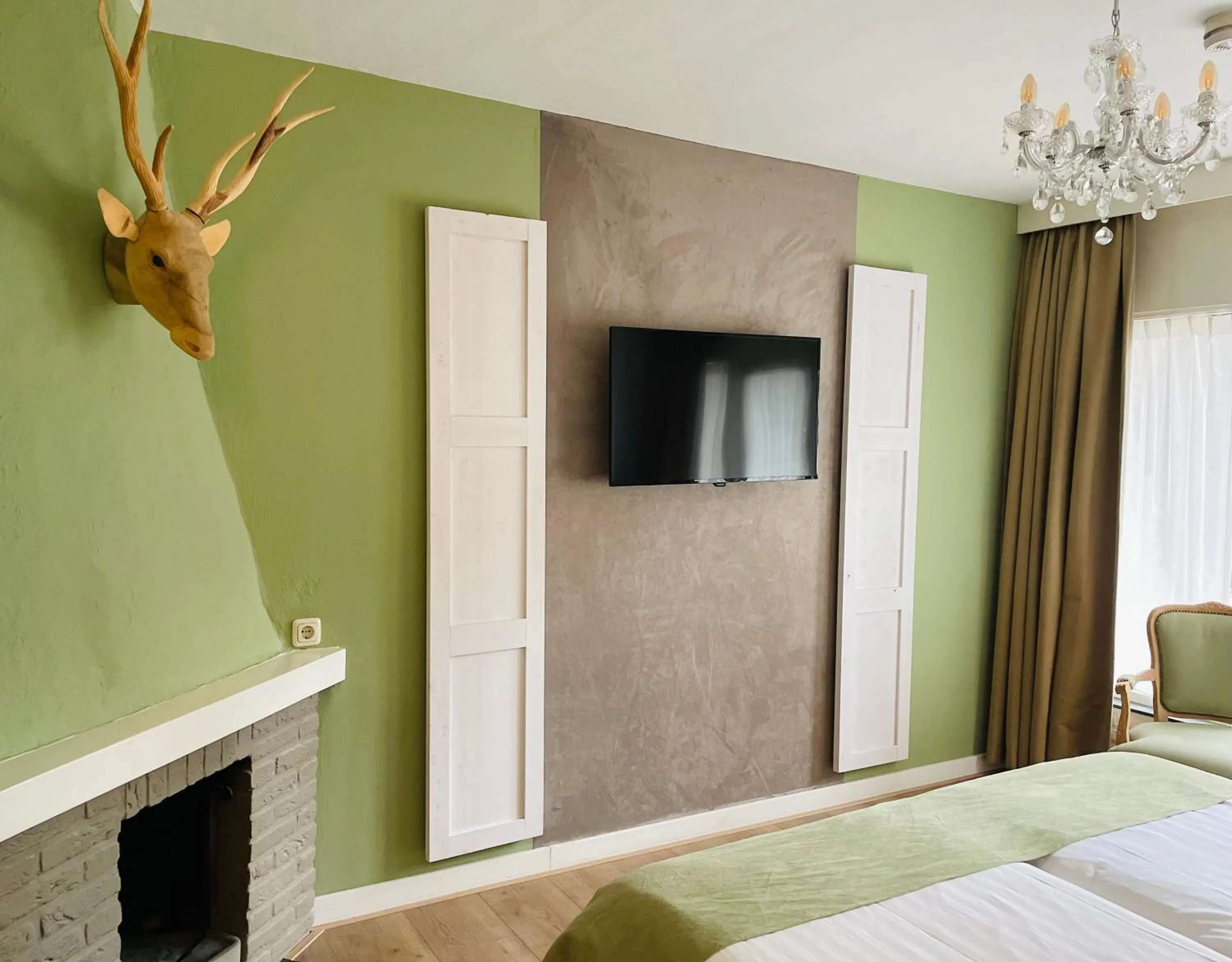 Communal lounge/ TV room, Bed in Landgoedhotel Villa Vennendal