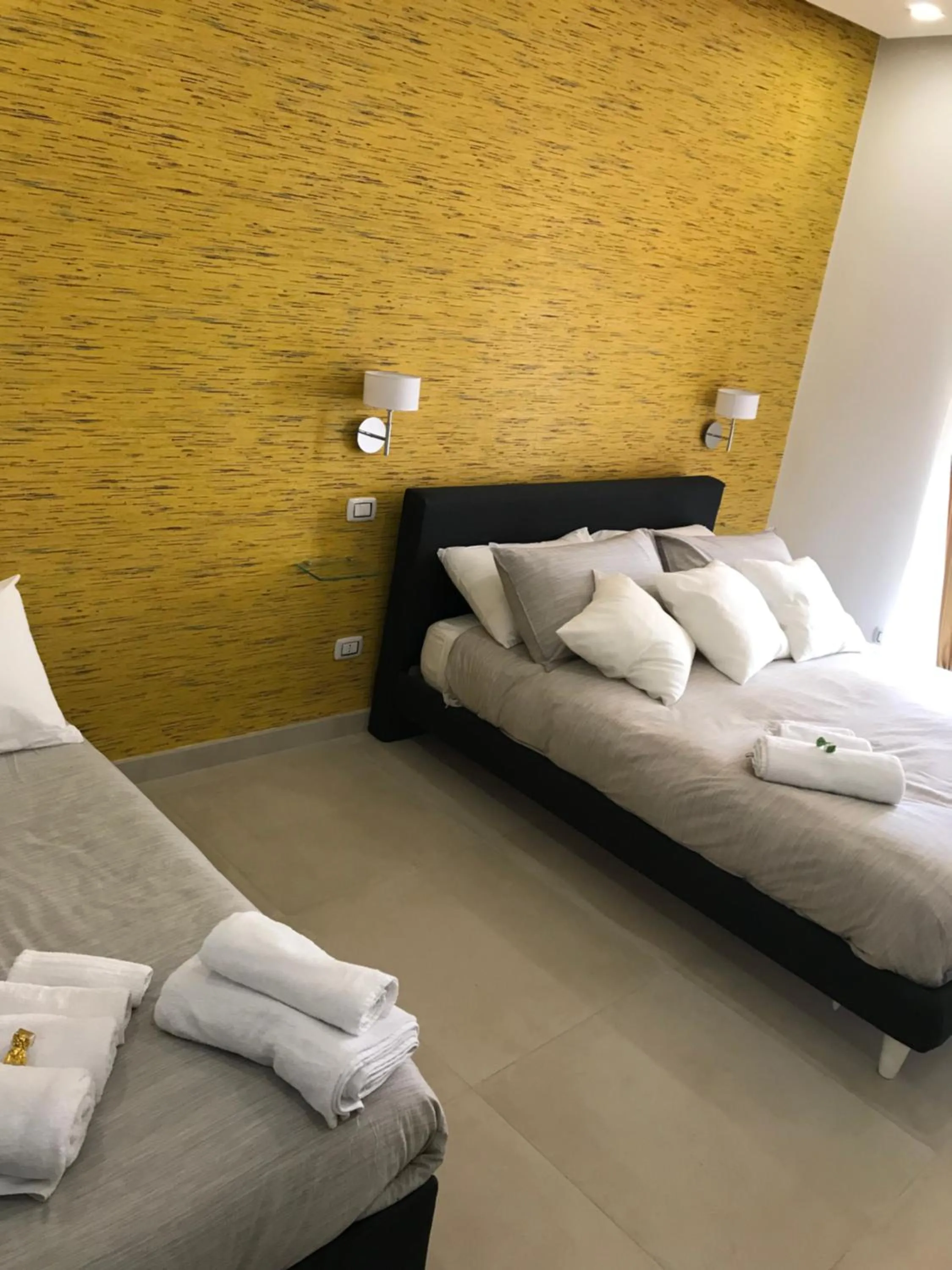 Bedroom, Bed in Terrazza Aragon Room and SPA