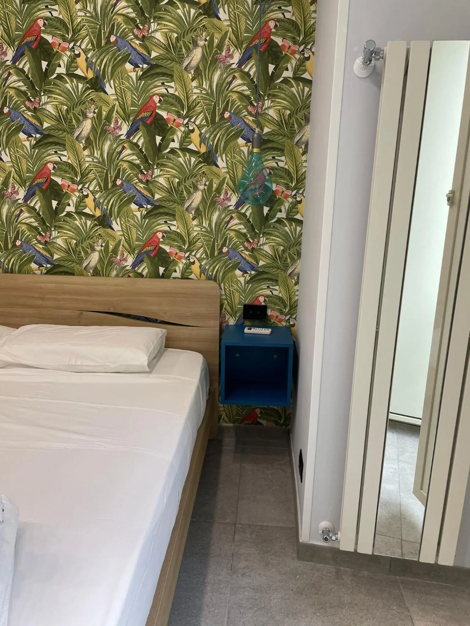 Bed in Terrazza Aragon Room and SPA