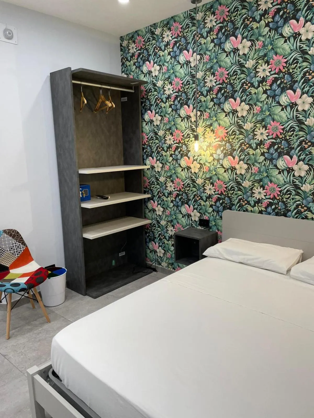 Bed in Terrazza Aragon Room and SPA