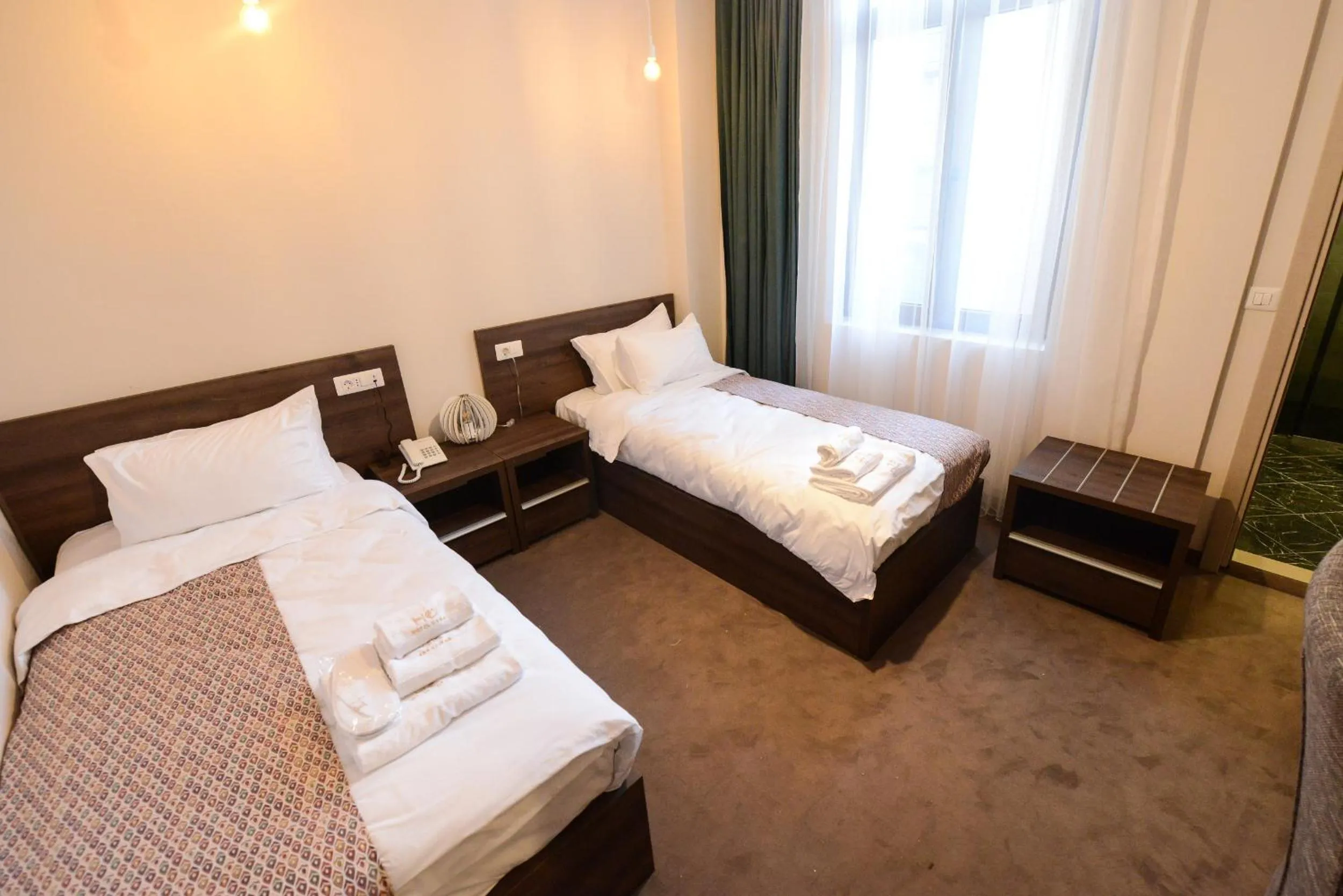 Bed in Hotel Cara 28