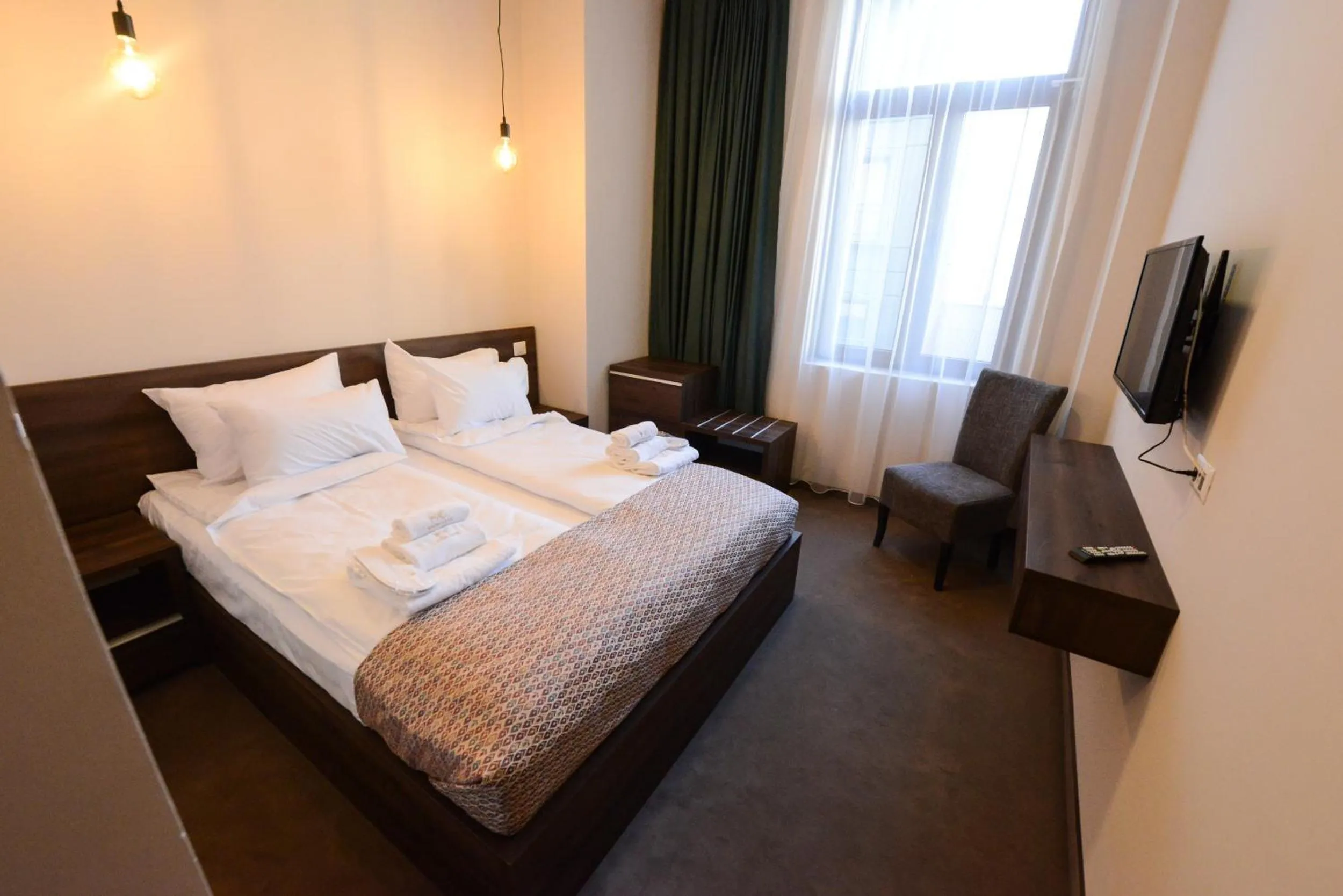 Bed in Hotel Cara 28