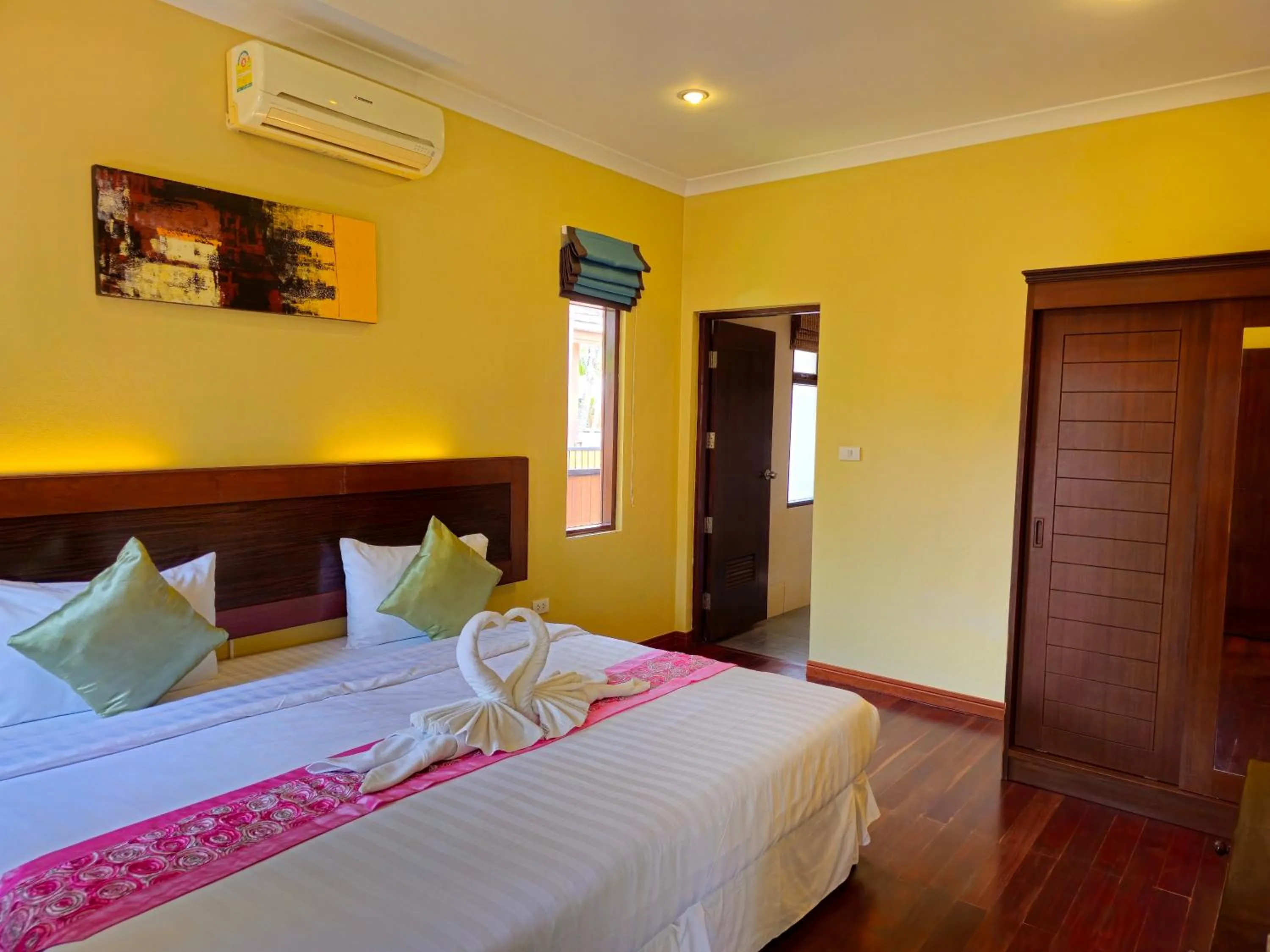 Bed in Baan Mesuk Hua Hin Spa and Resort