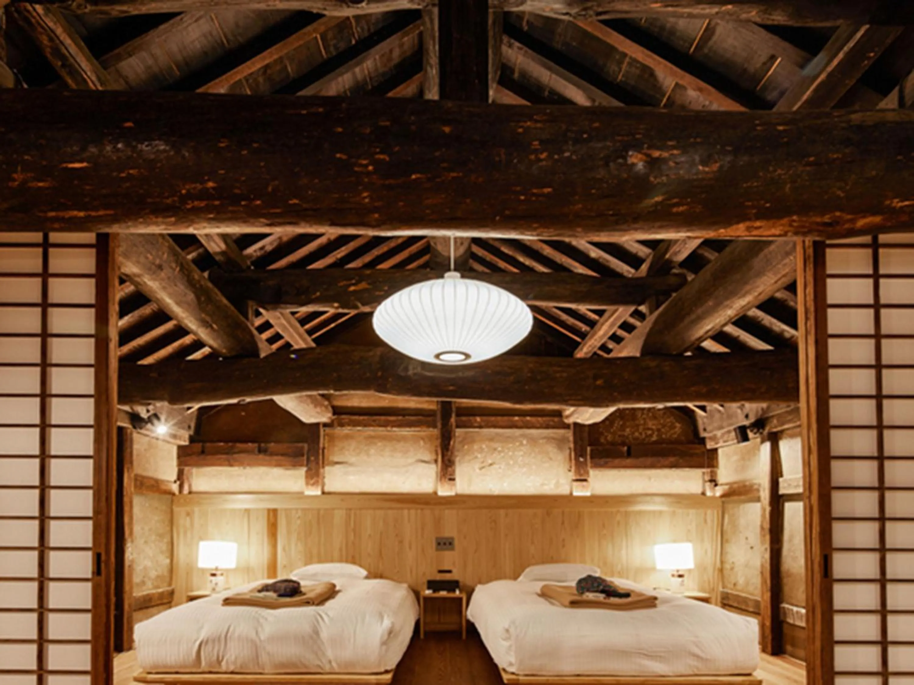 Bed in NIPPONIA Sawara Merchant Town Hotel