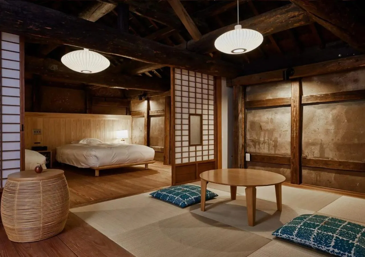 Bed in NIPPONIA Sawara Merchant Town Hotel