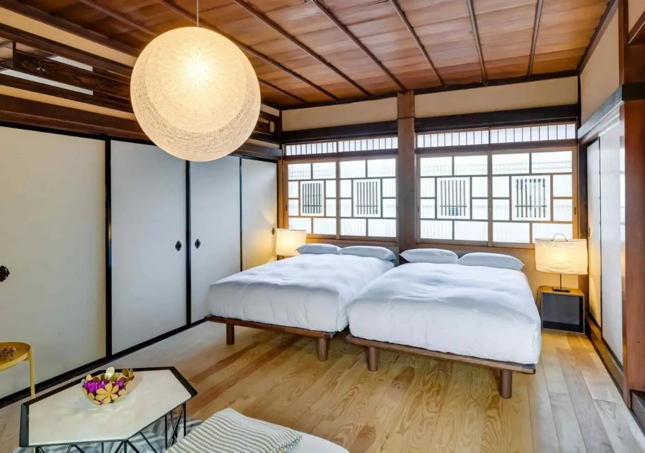 Bed in NIPPONIA Sawara Merchant Town Hotel