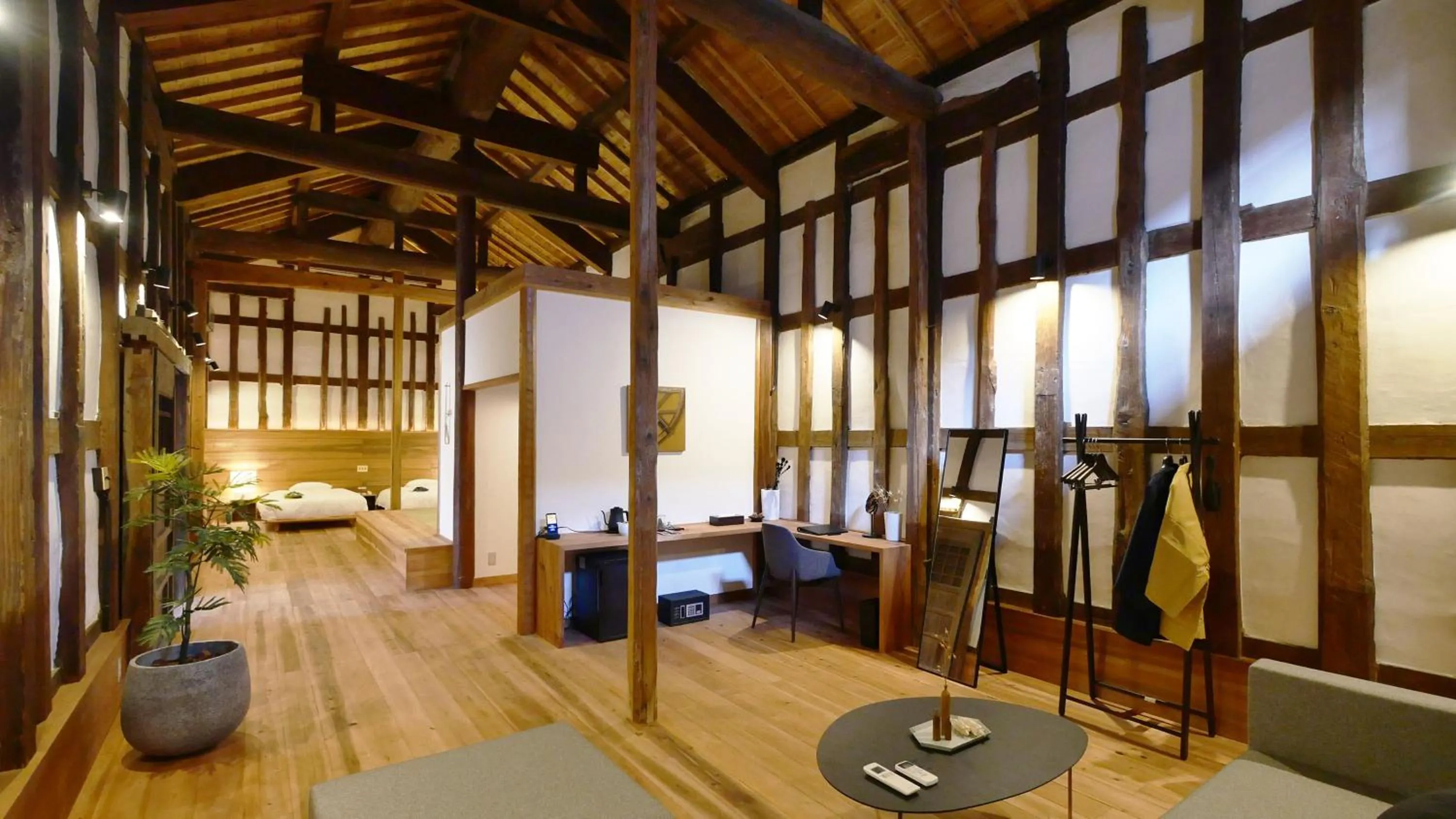 Bed in NIPPONIA Sawara Merchant Town Hotel