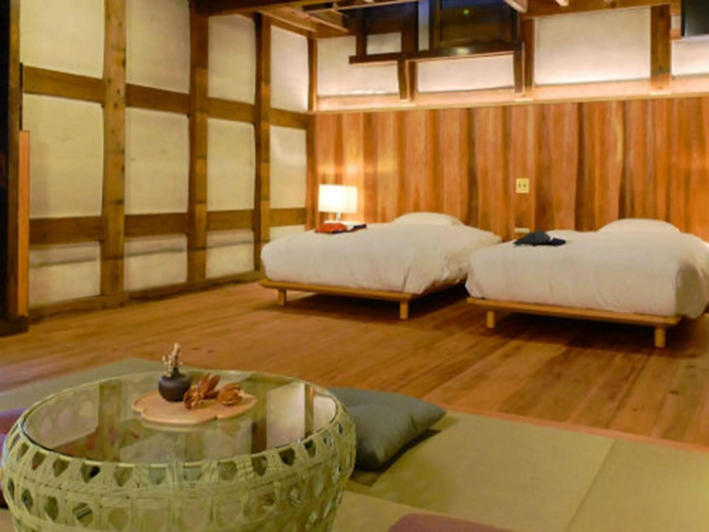 Bed in NIPPONIA Sawara Merchant Town Hotel