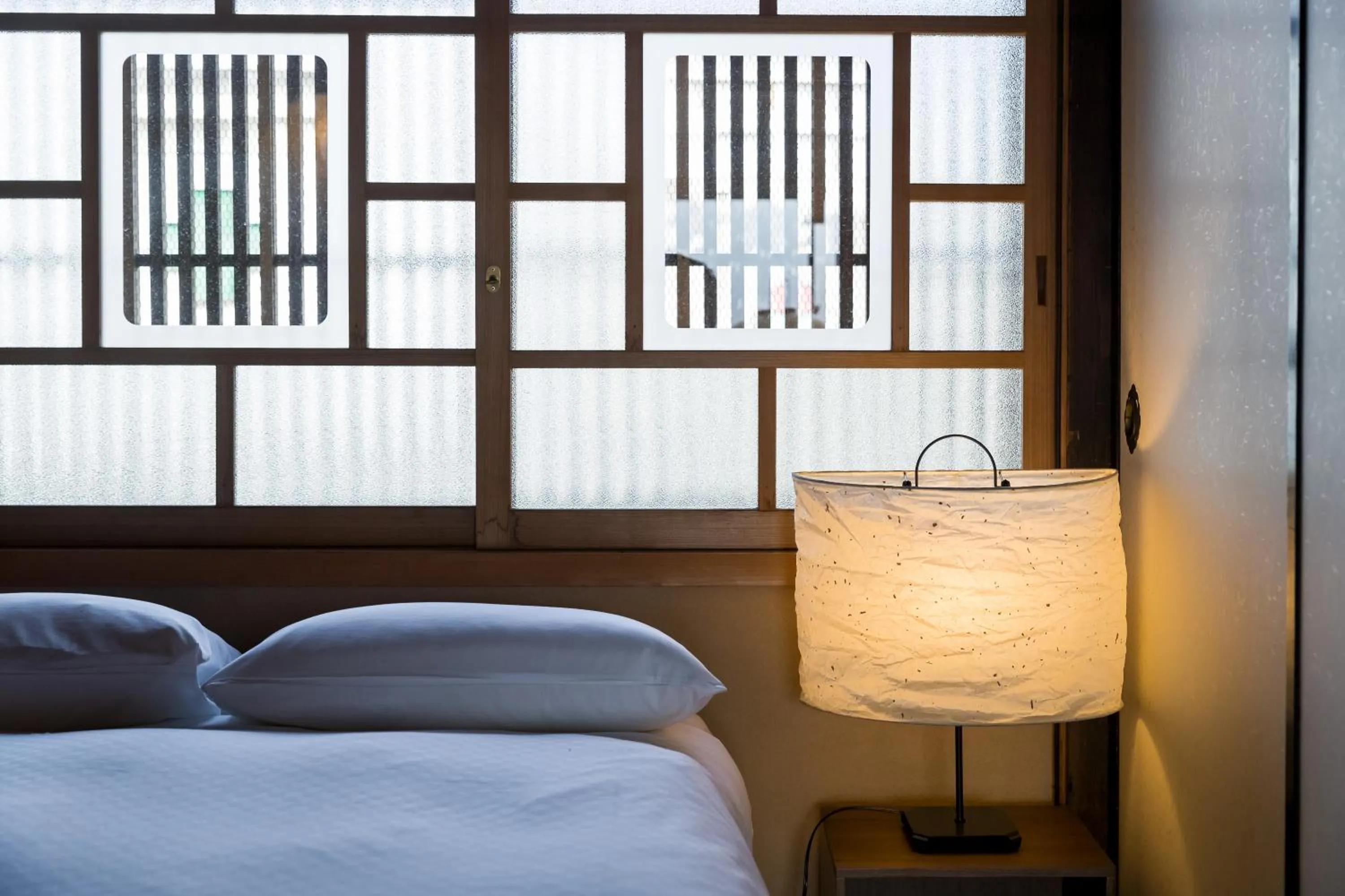 Bed in NIPPONIA Sawara Merchant Town Hotel