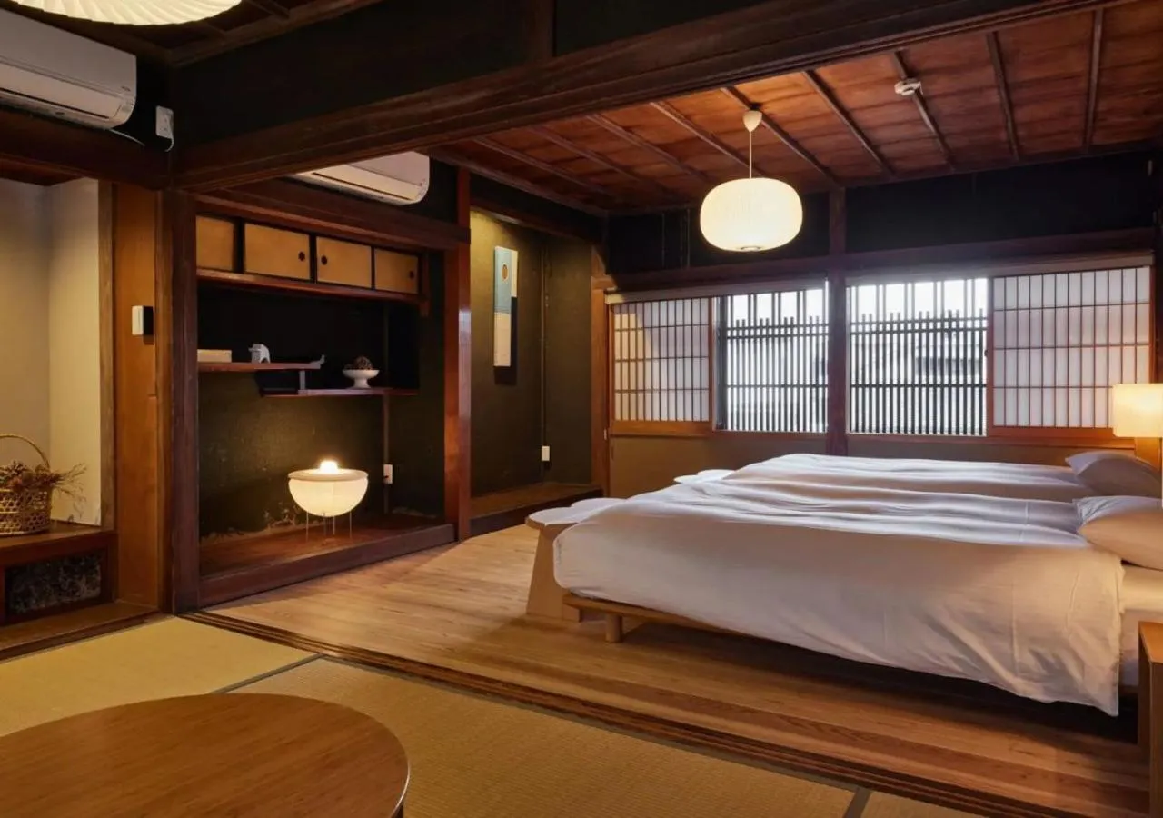 Bed in NIPPONIA Sawara Merchant Town Hotel