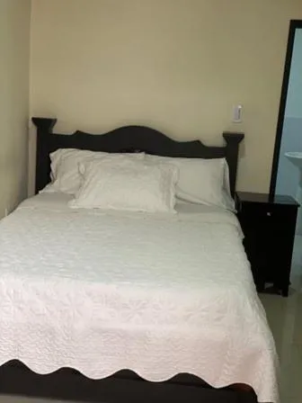 Bed in Hotel Aroma del Bosque Posada Cafe