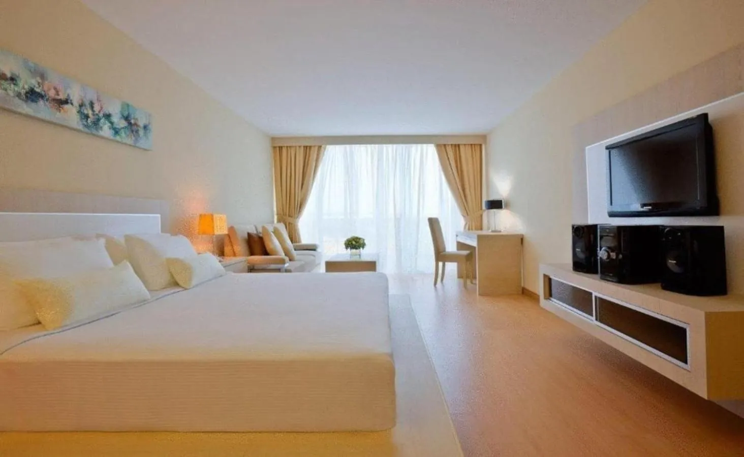 Bed in Blanco Apartment Hotel