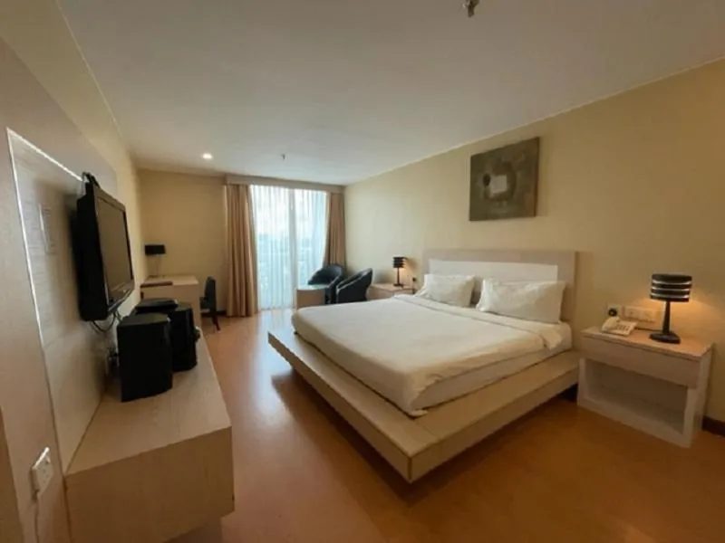 Bed in Jinhold Apartment Hotel