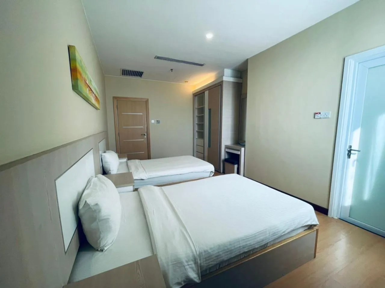 Bed in Jinhold Apartment Hotel