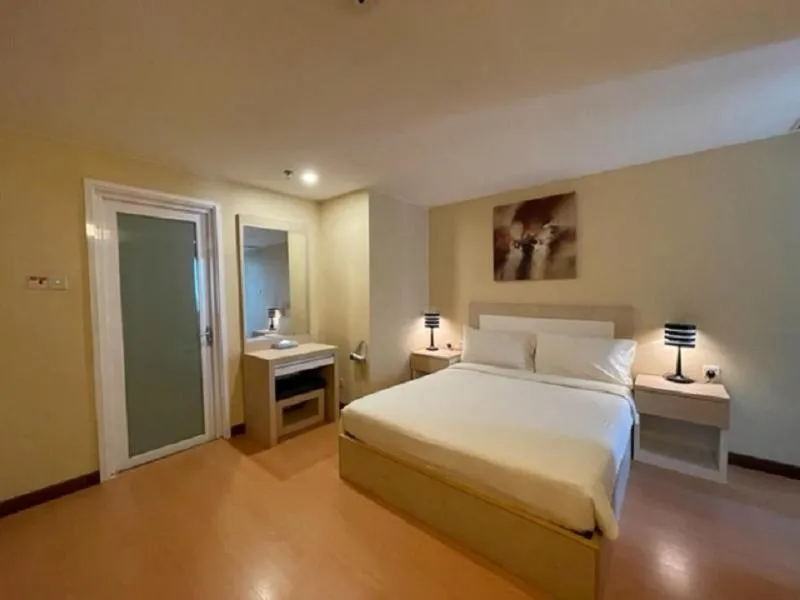 Bed in Jinhold Apartment Hotel