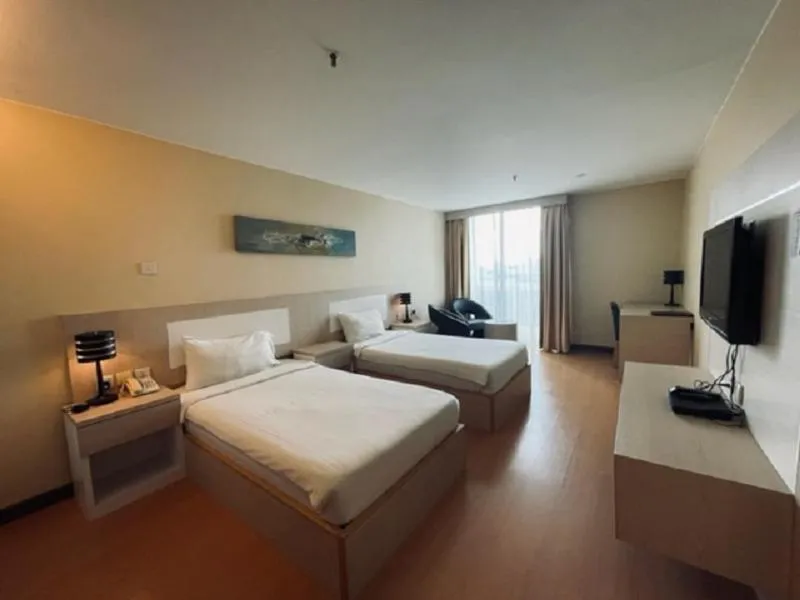 Bed in Jinhold Apartment Hotel