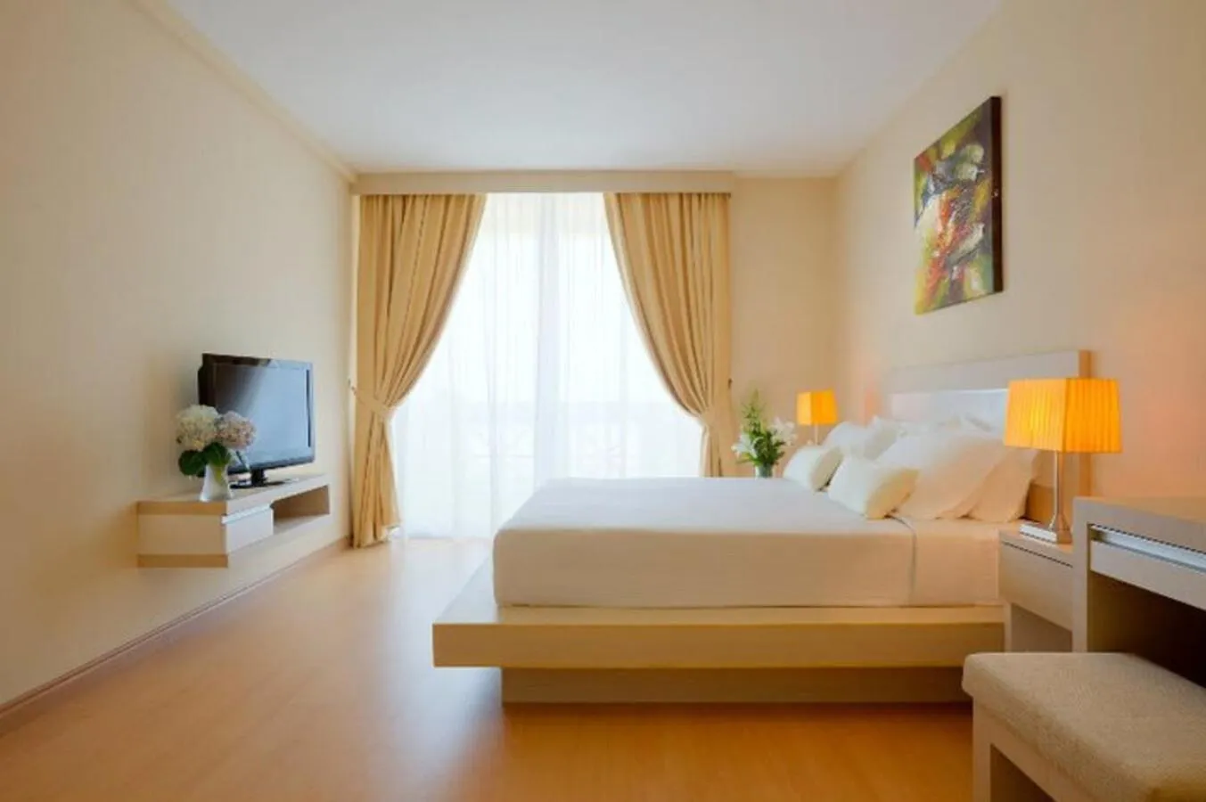 Bed in Blanco Apartment Hotel