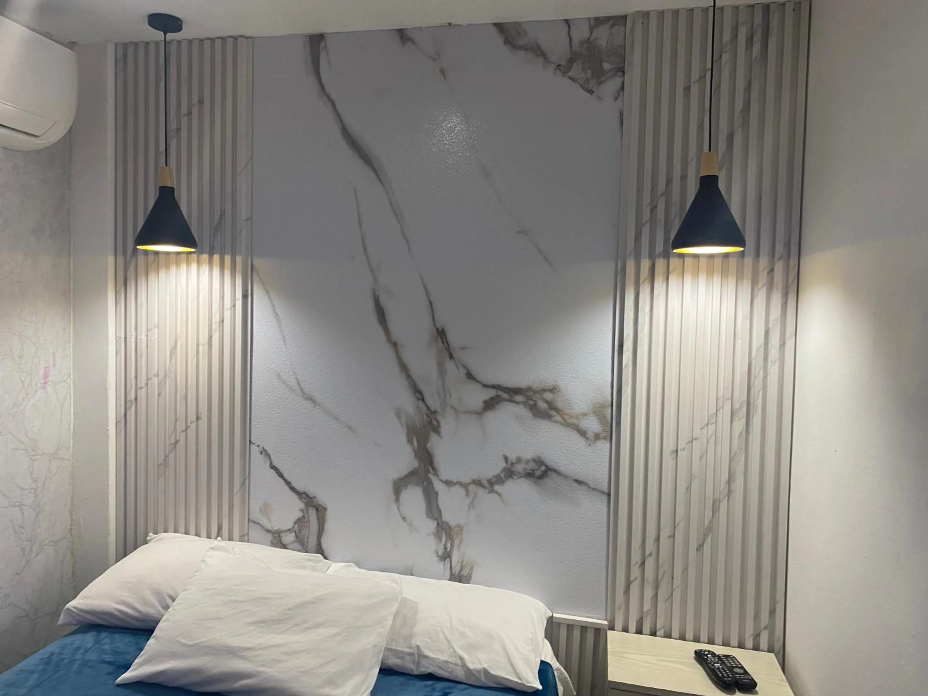 Bed in Apartamentos Magallanes Romana