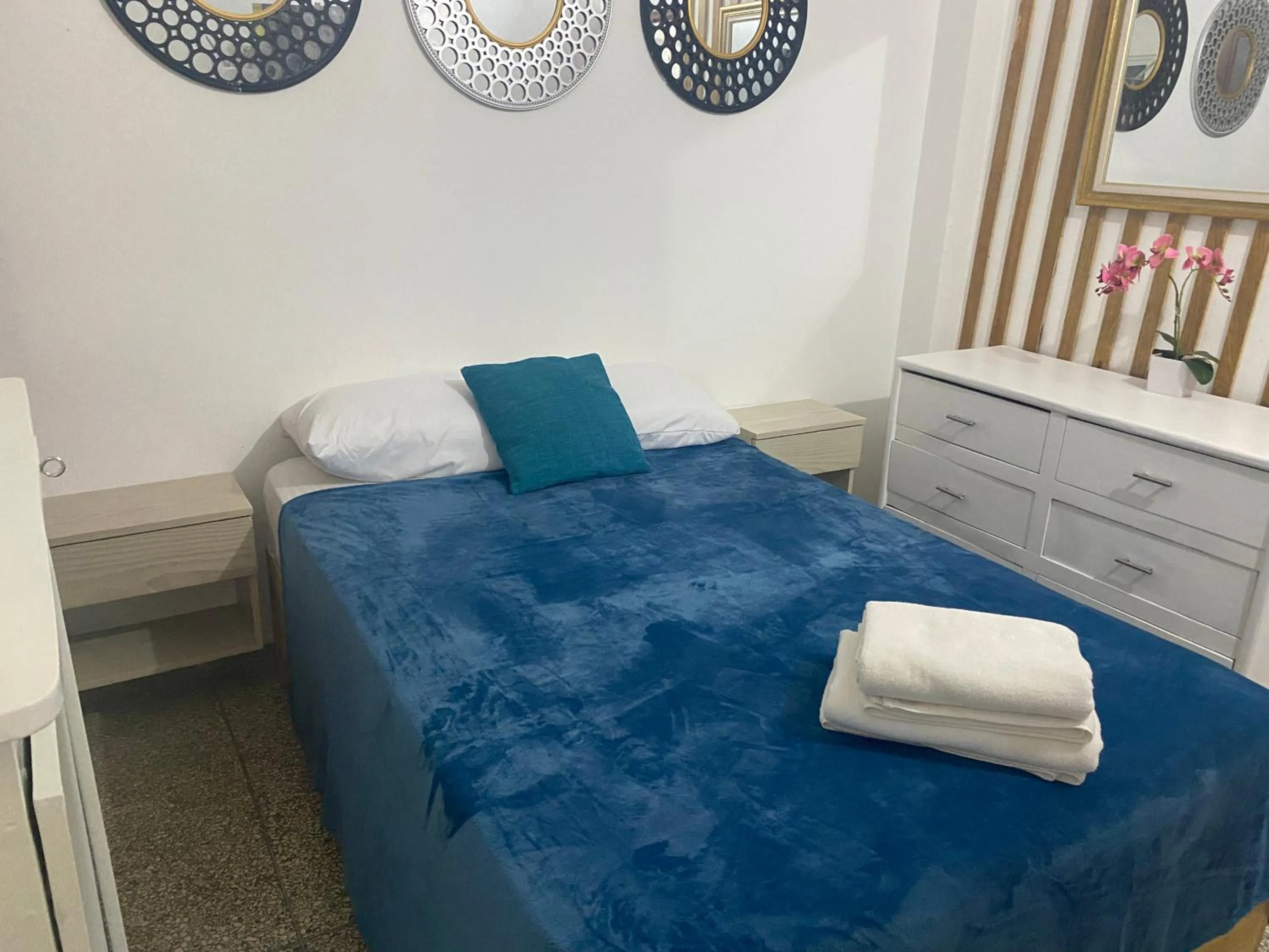 Bed in Apartamentos Magallanes Romana