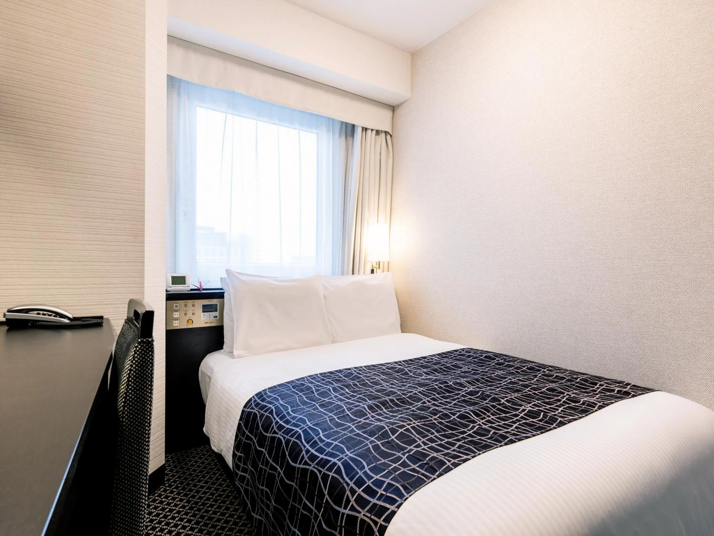 Photo of the whole room, Bed in APA Hotel Higashi Umeda Minami Morimachi Ekimae