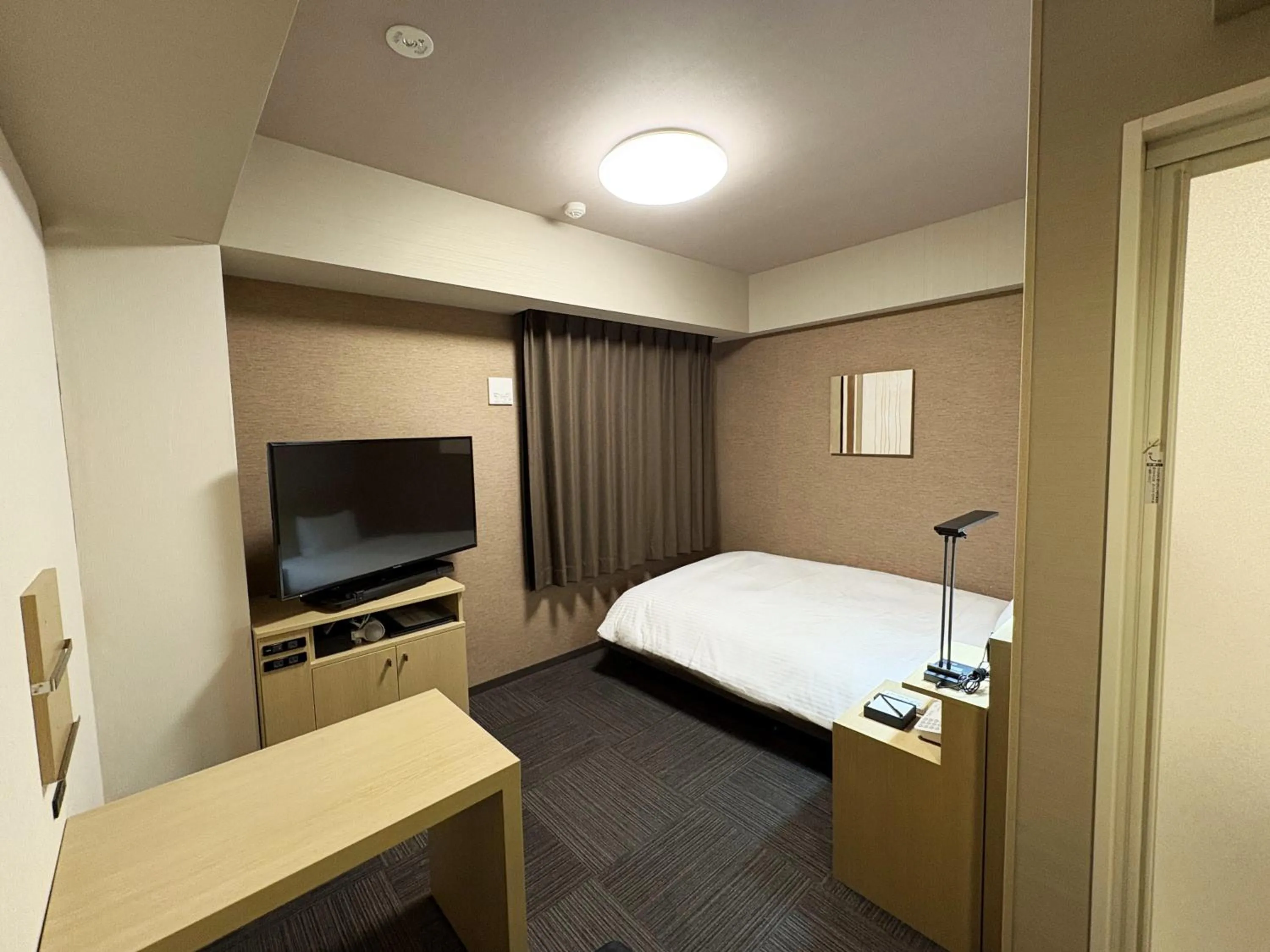 Photo of the whole room, Bed in Hotel Route-inn Utsunomiya Yuinomori -Lightline Yuinomori Nishi Ekimae-