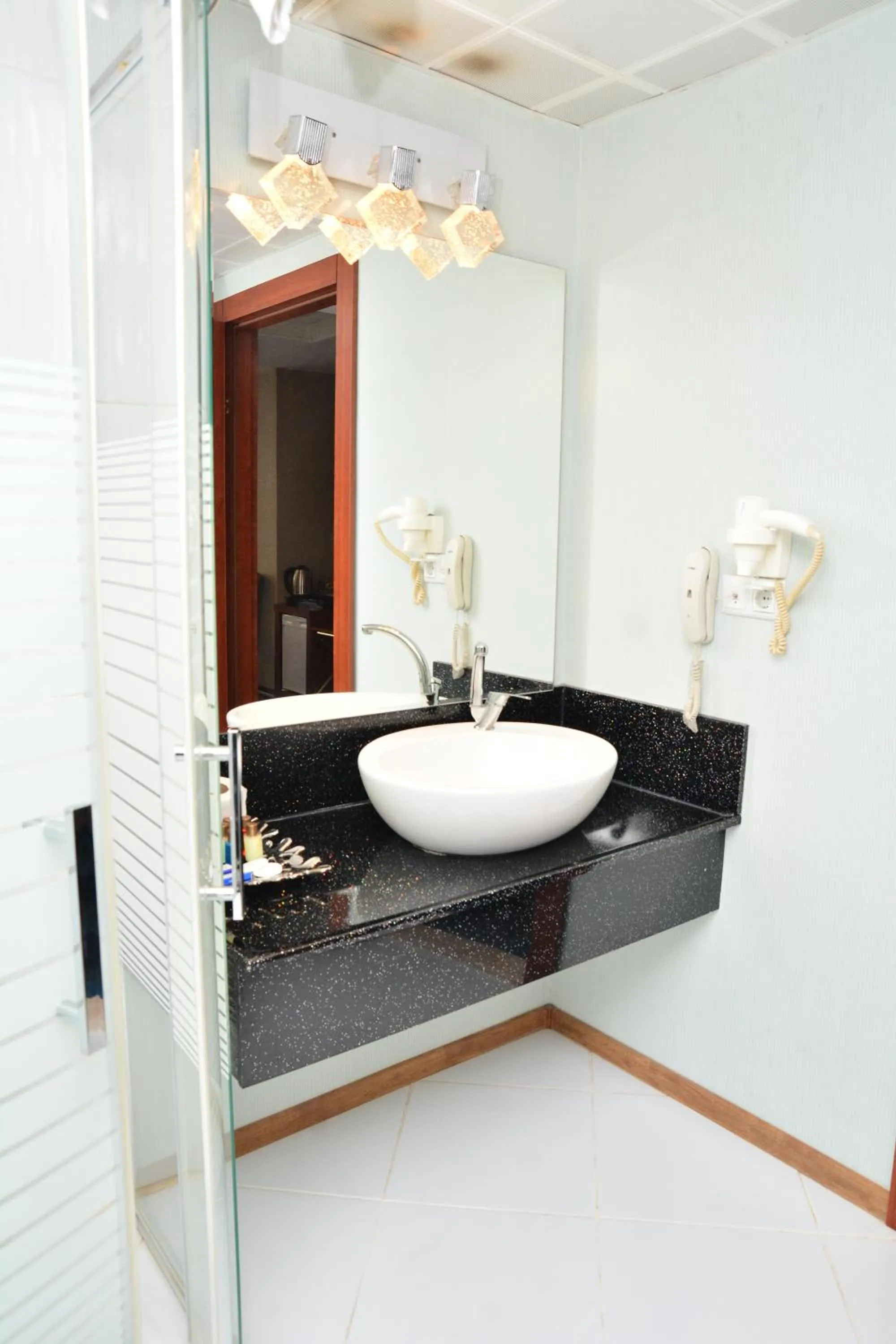 Bathroom in Business Grand Hotel