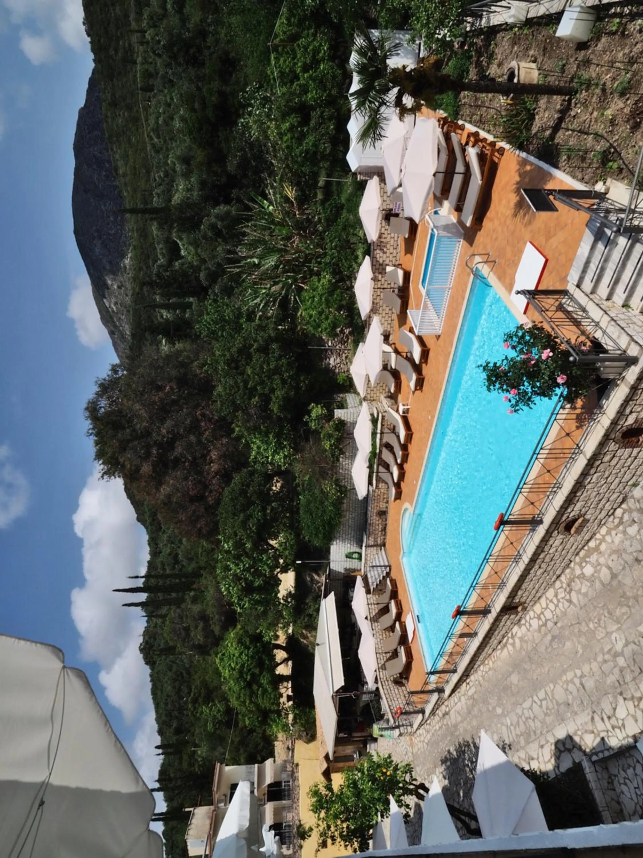 Swimming pool in Bella Vista Hotel Studios & Apartments