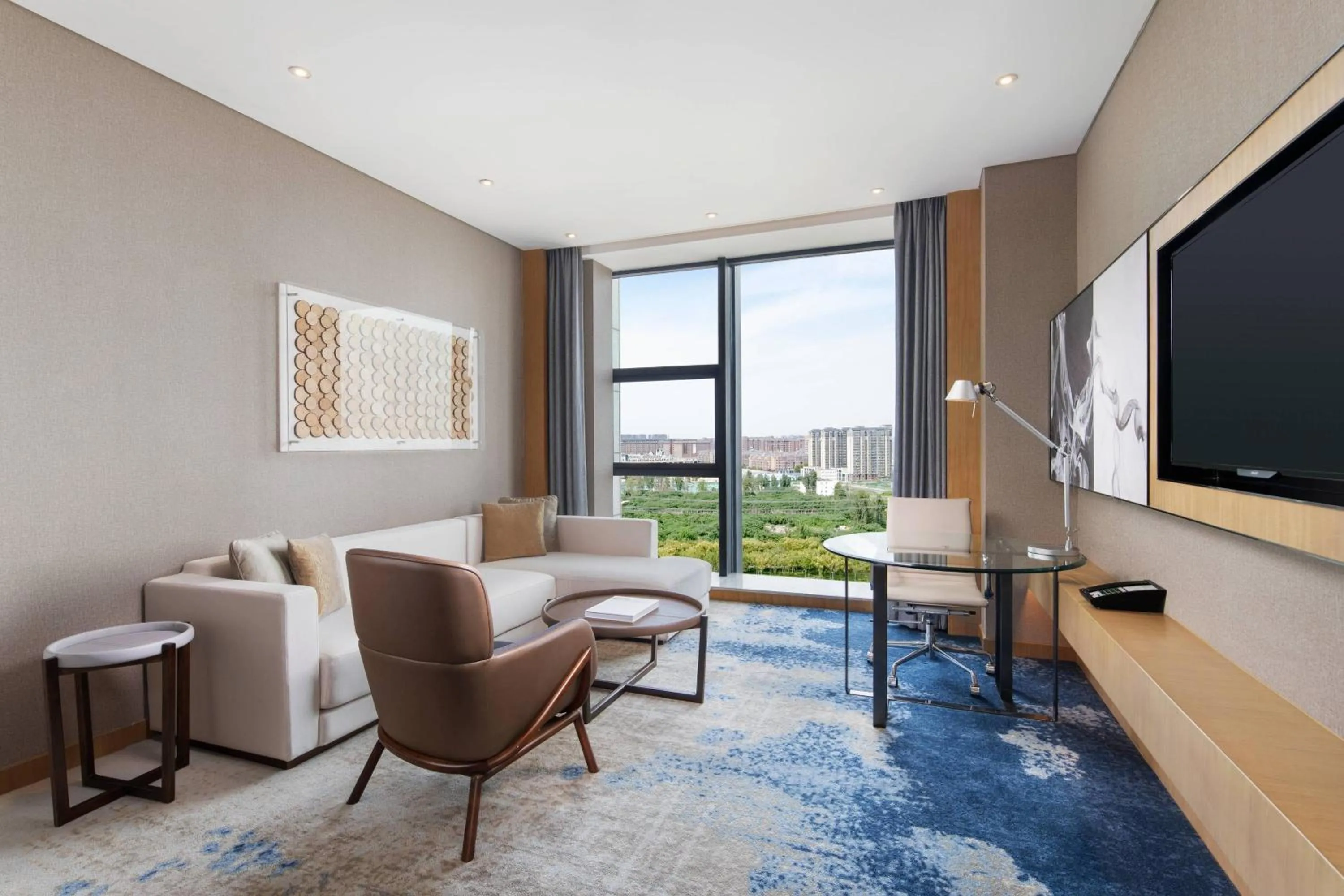 Living room in Courtyard by Marriott Zhengzhou Airport