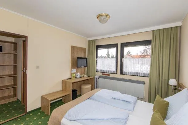 Photo of the whole room, Bed in Spreewaldhotel Garni Raddusch