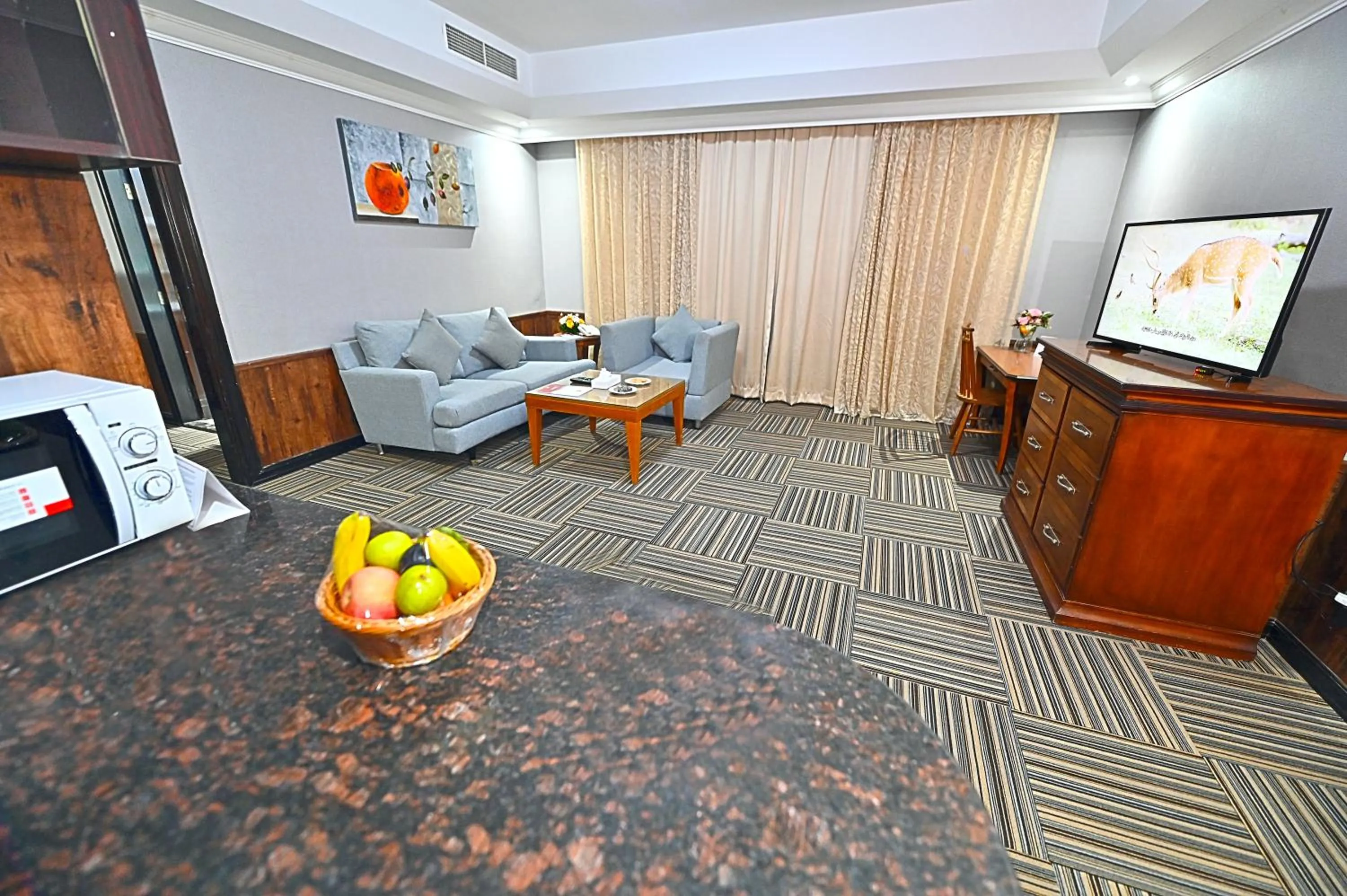 Living room in Ewan Ajman Suites Hotel