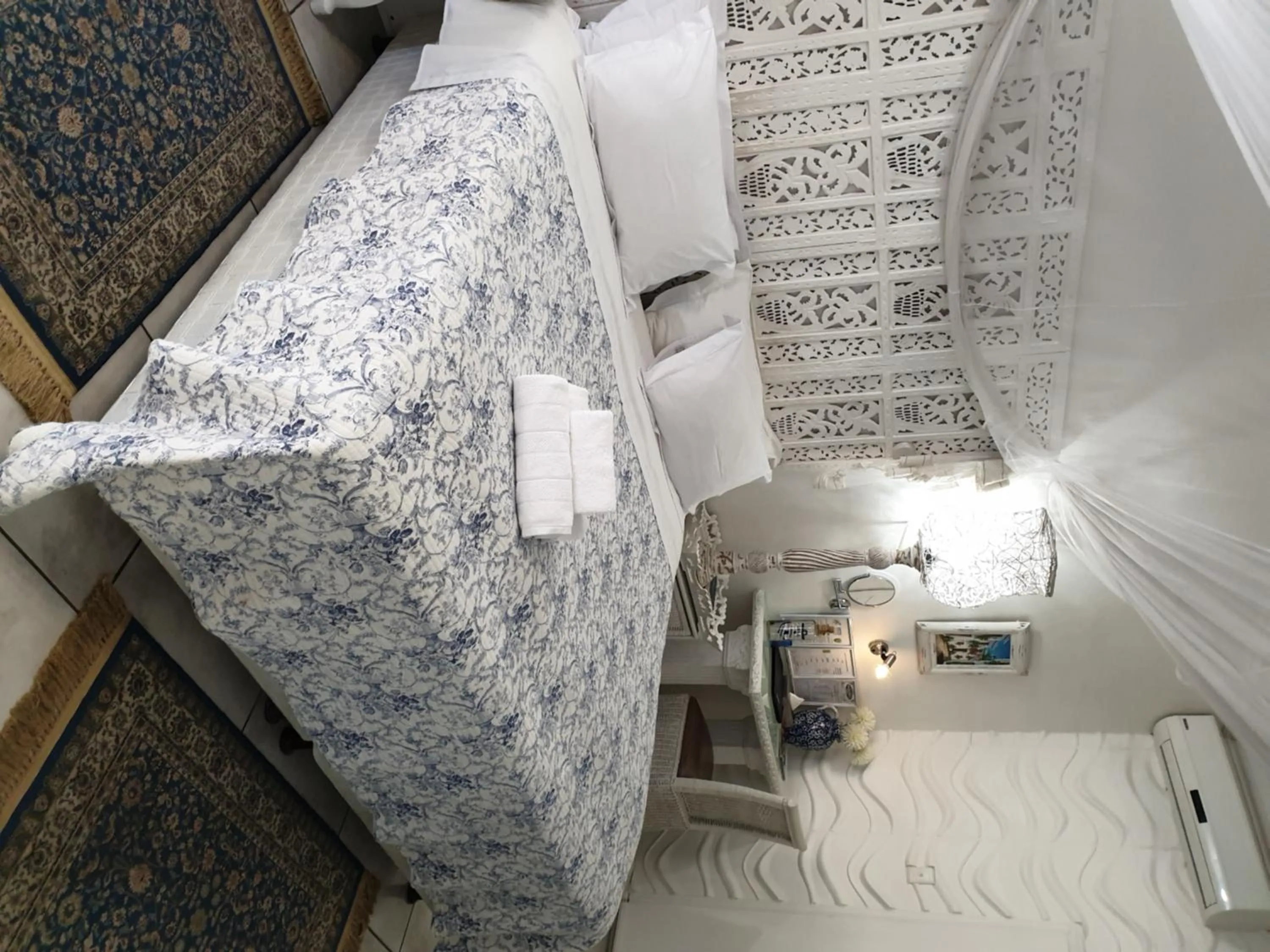 Bed in Belurana River Manor