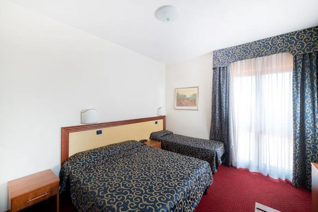 Bed in Hotel Italia & Lombardi