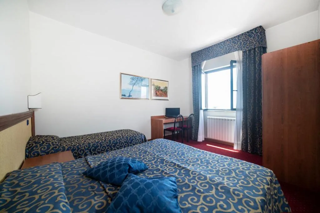 Bed in Hotel Italia & Lombardi