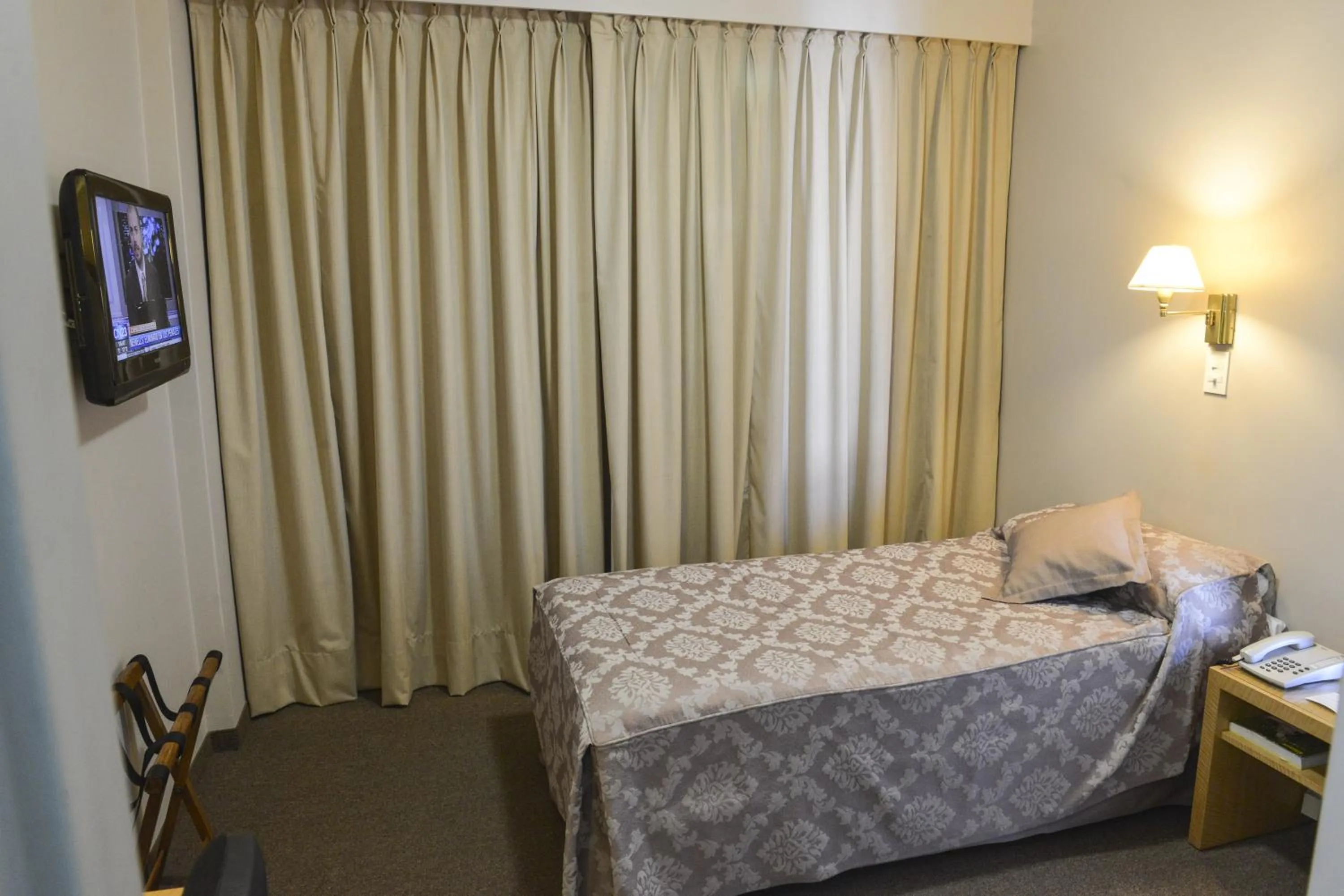 Bed in Comodoro Hotel