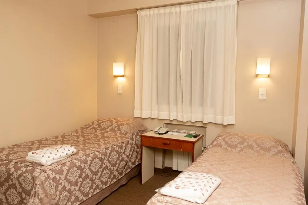 Bed in Comodoro Hotel