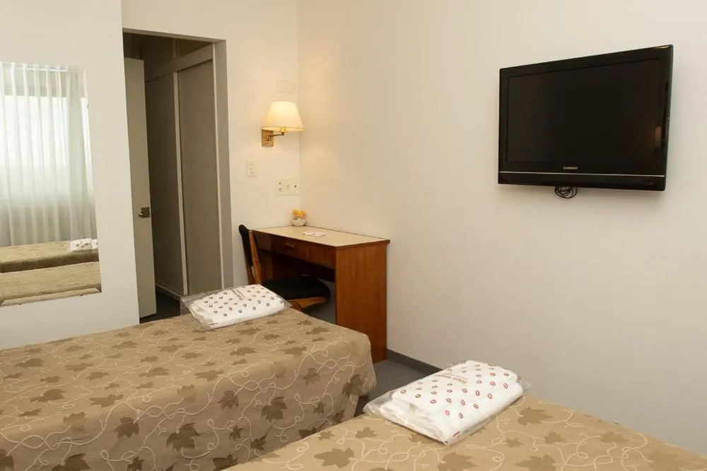 Bed in Comodoro Hotel