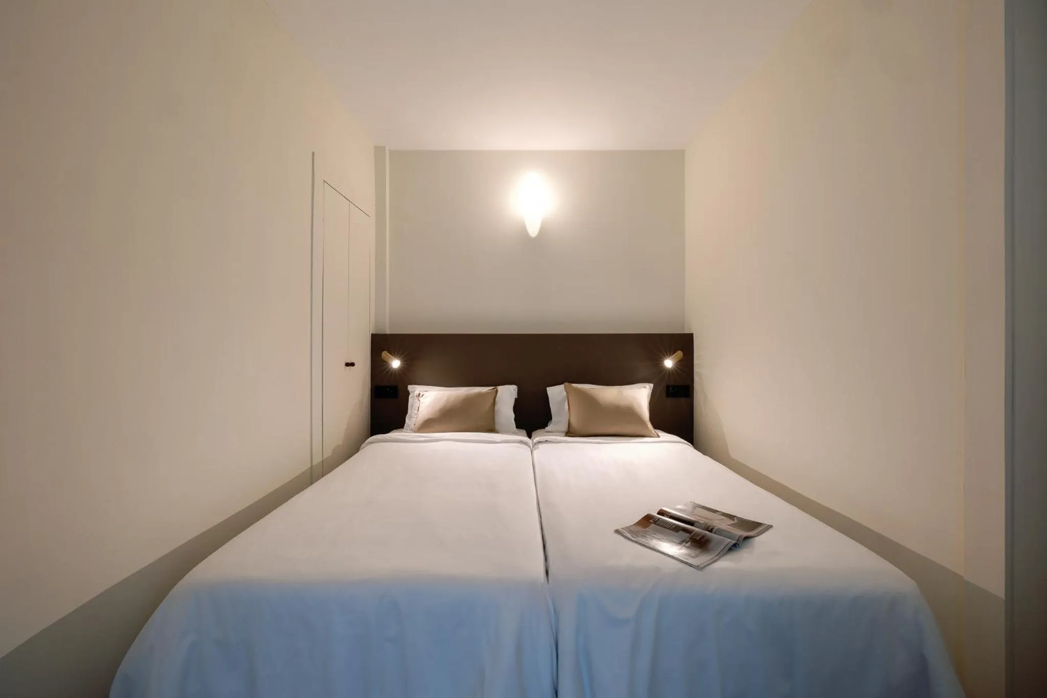 Bedroom, Bed in Cosme Apartments by Olala Homes