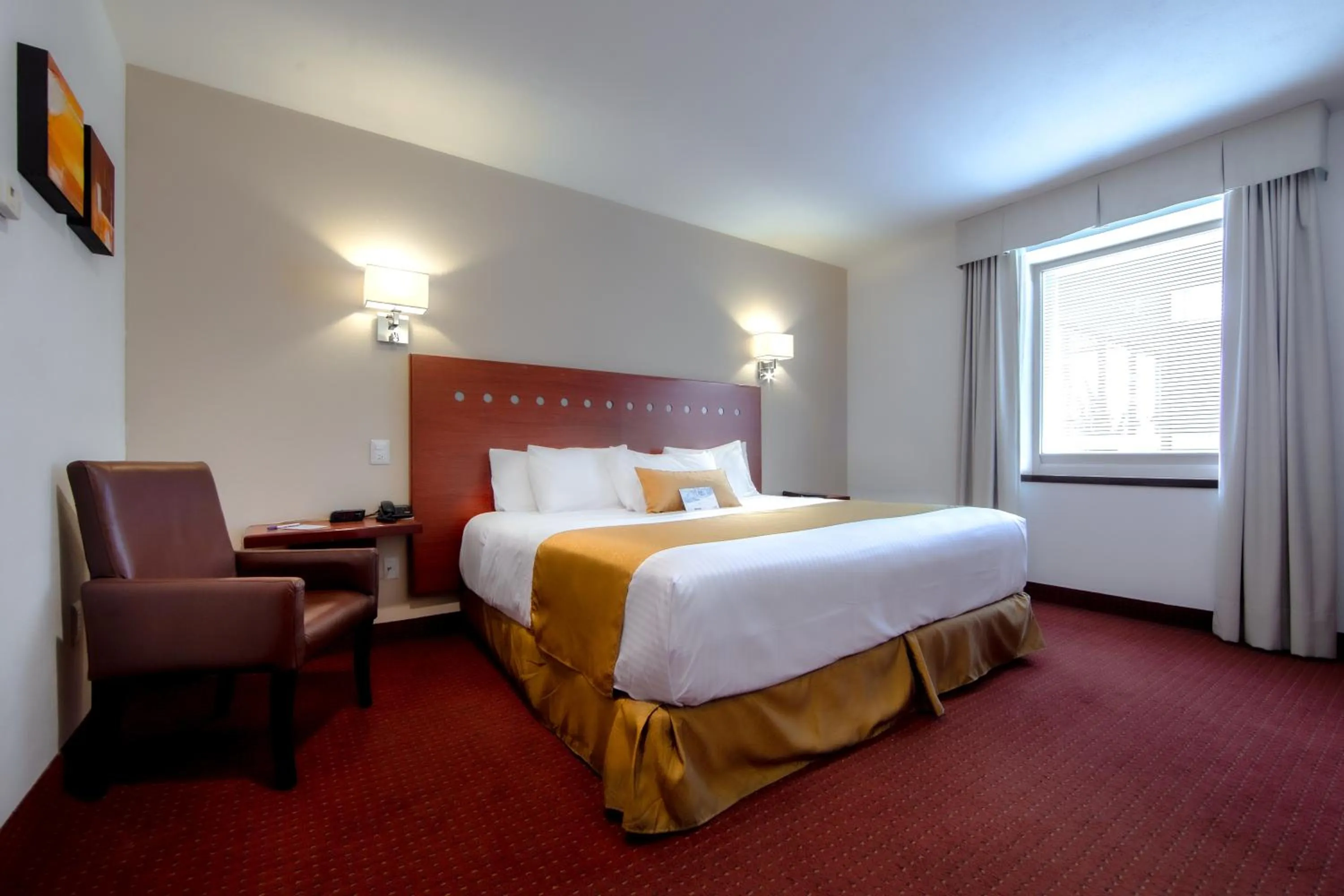 Bed in Hotel Cayala Inn