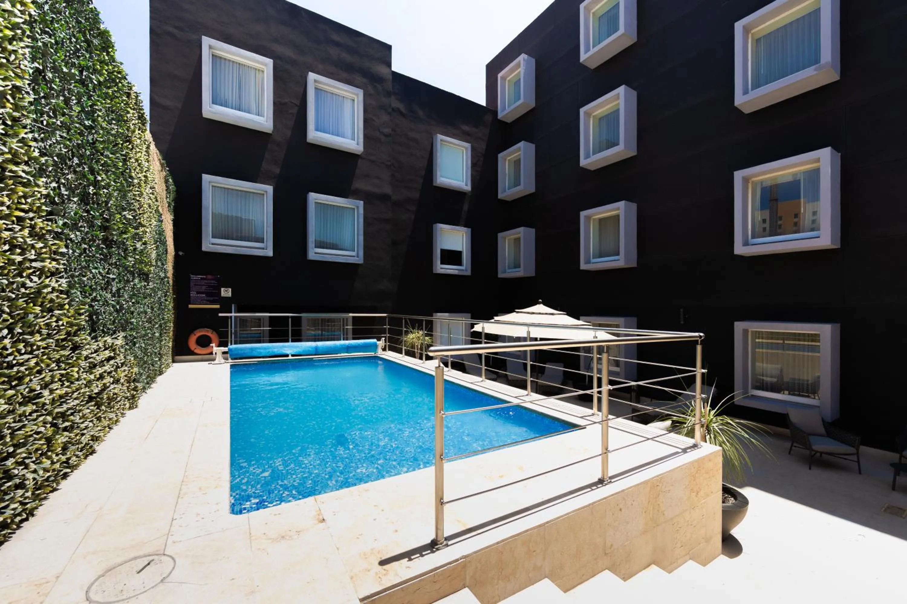 Property building, Swimming Pool in Hotel Cayala Inn