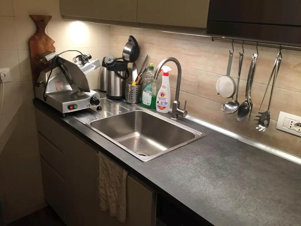 Kitchen or kitchenette in Relais Totì BeB bed e breakfast